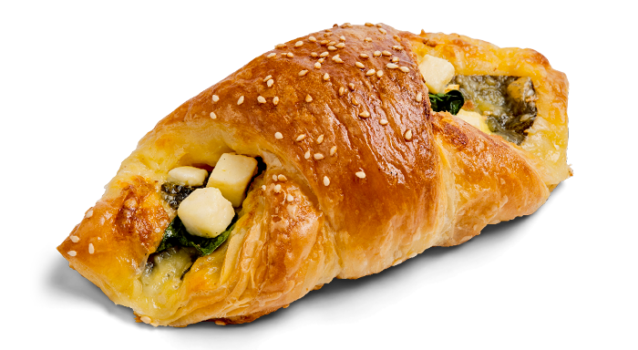 Cheese and spinach stuffed savory croissant with sesame seeds.