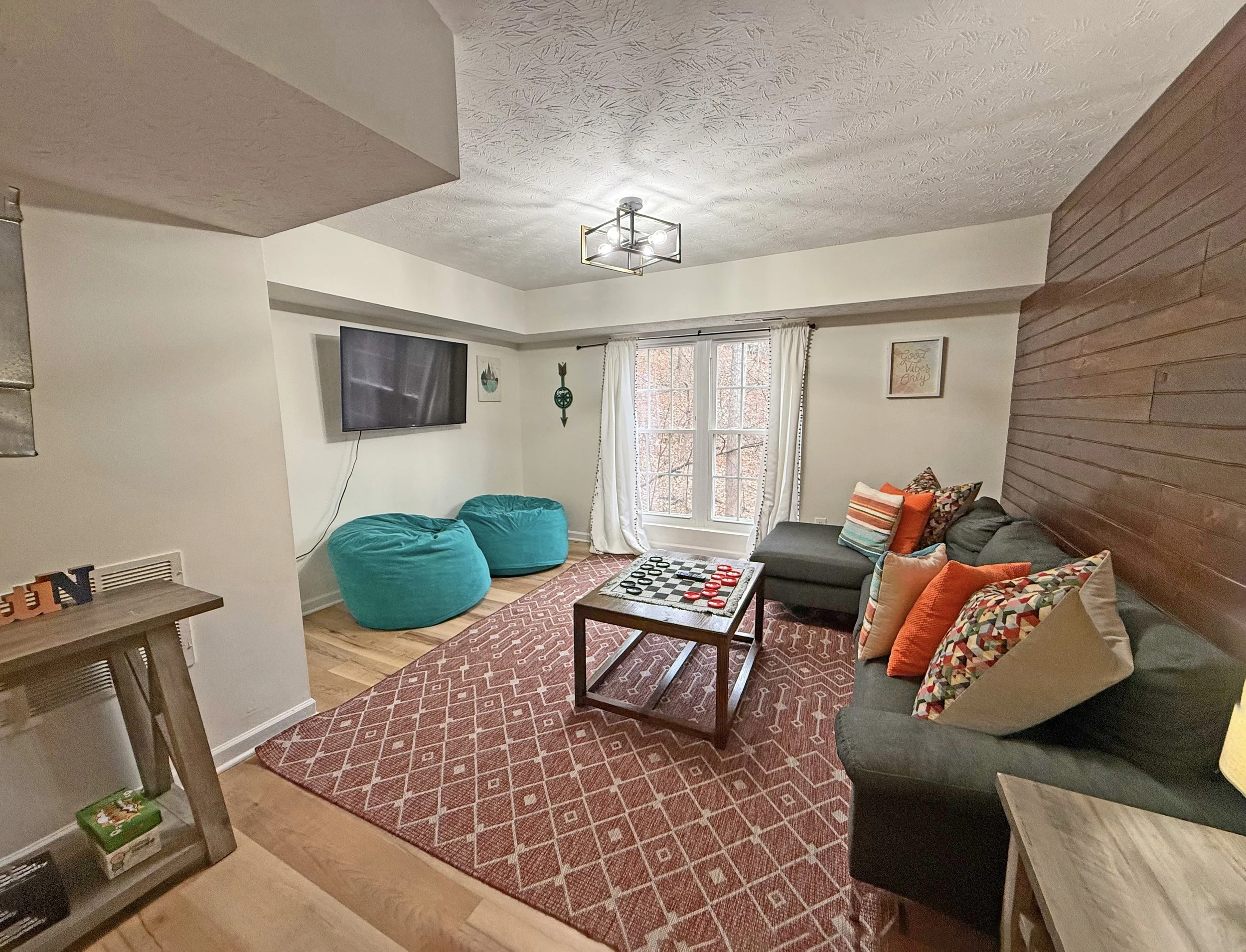 [Lower Level Living Room]  Vacation requirement: a second living room because sometimes you need a little extra space.