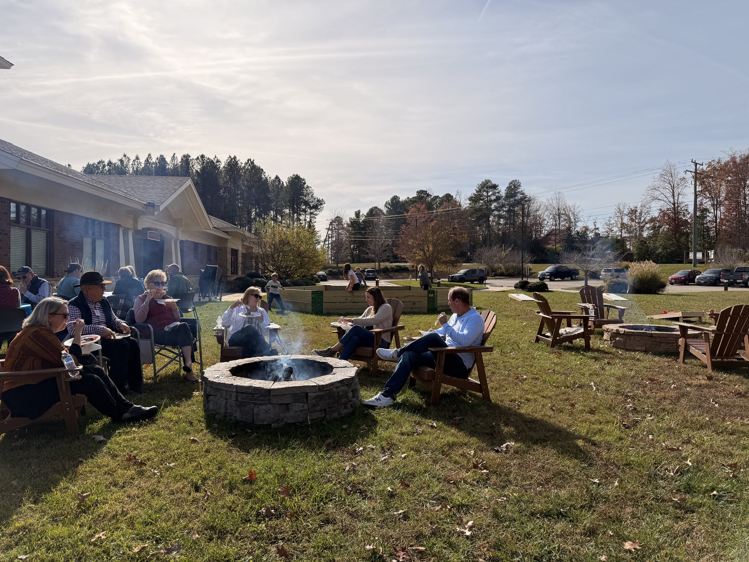 People sitting around firepit