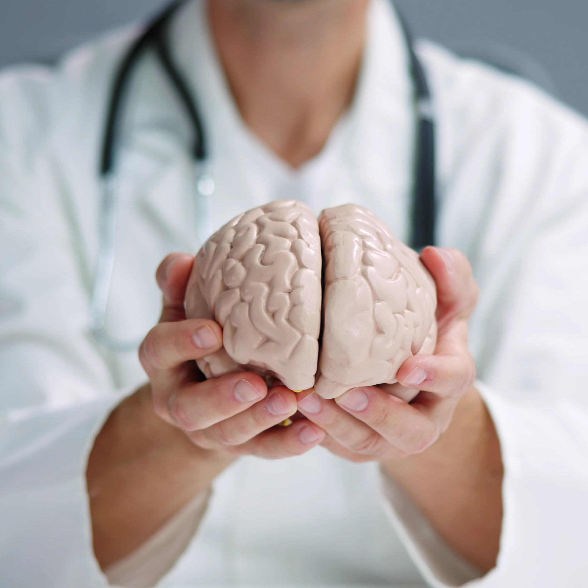 Occupational therapist supporting neurological recovery after brain injury