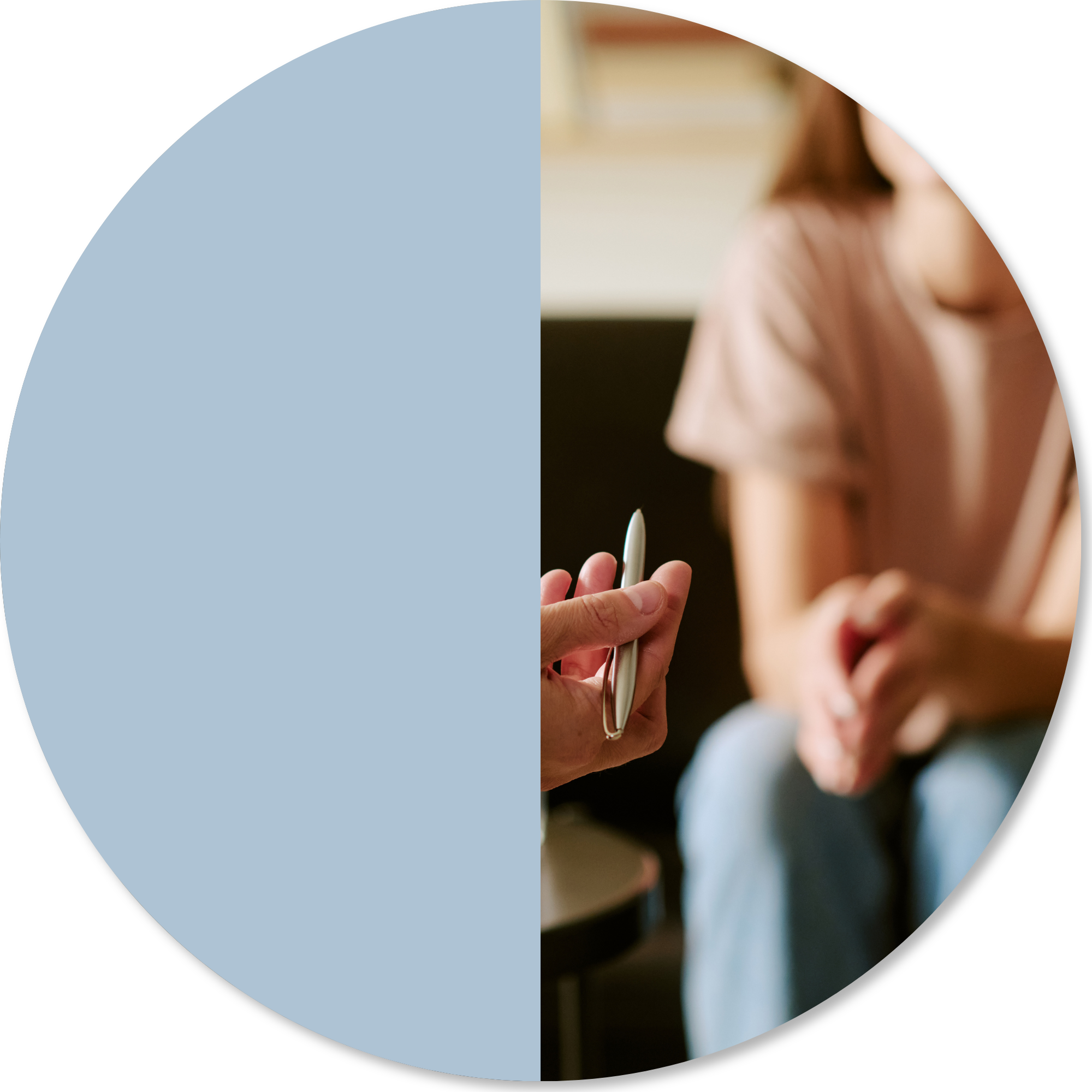 Occupational therapist speaking with a client during an assessment session, representing collaborative evaluation of functional challenges, goals, and support needs in neurological rehabilitation