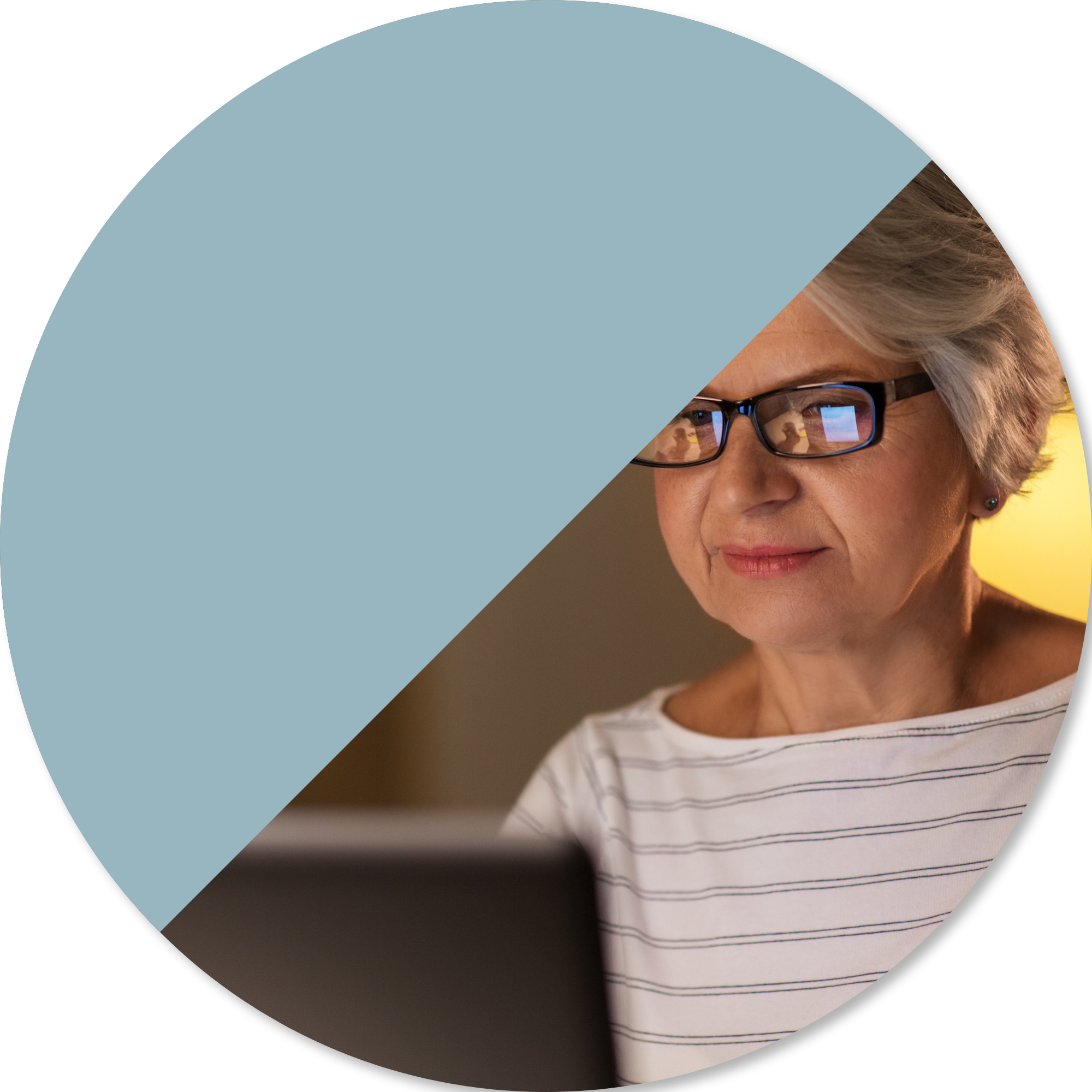 Older woman using a laptop during a telehealth appointment, representing accessible online occupational therapy support, connection, and care from home for people managing neurological conditions or mobility challenges