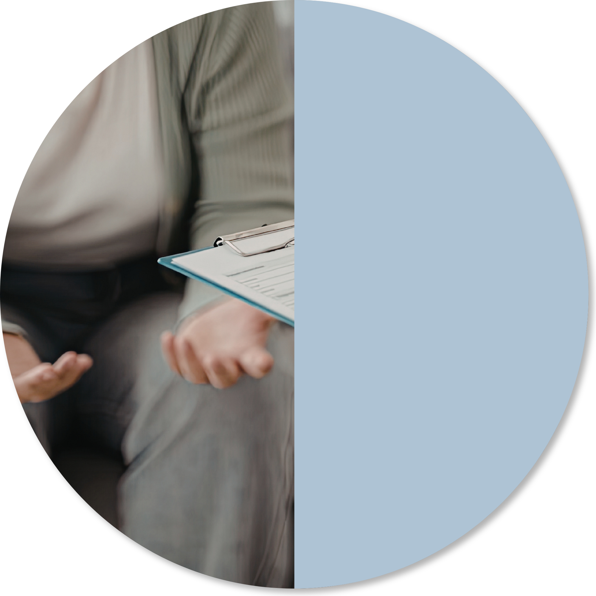 Occupational therapist holding assessment paperwork while speaking with a client, representing collaborative assessment, goal setting, and personalised support planning for neurological rehabilitation and daily functioning.