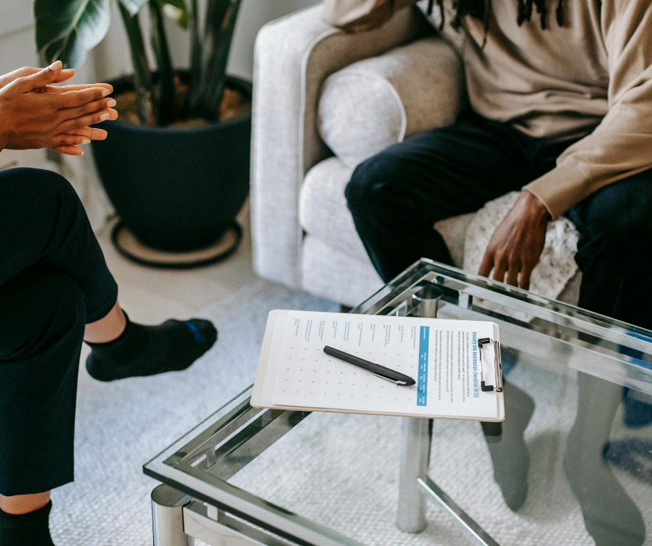 Occupational therapist meeting with a client during a functional capacity assessment consultation