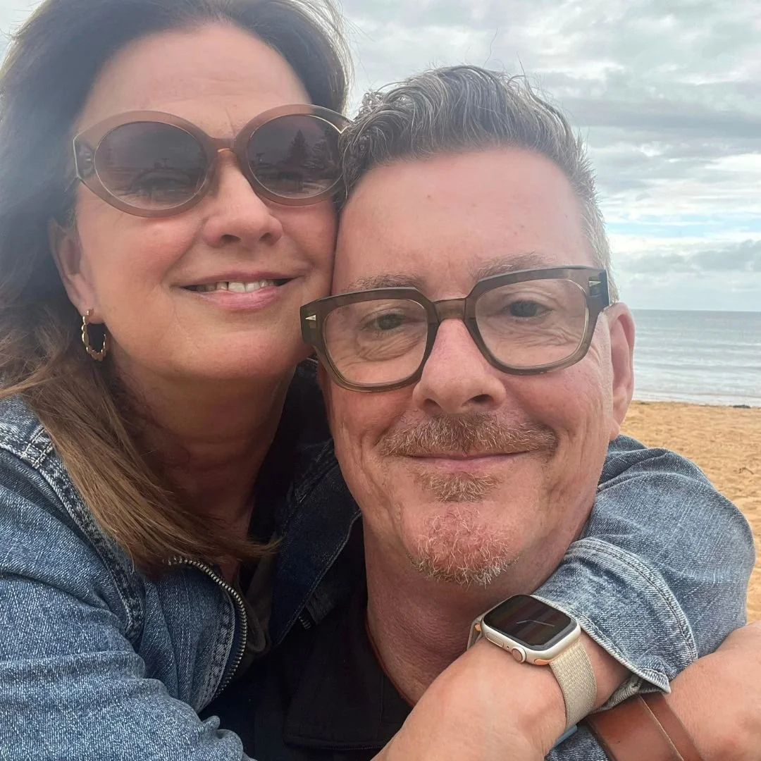 Naomi and Mark at the beach after Mark's spinal cord injury, showing that life, love and meaningful recovery continue after SCI.