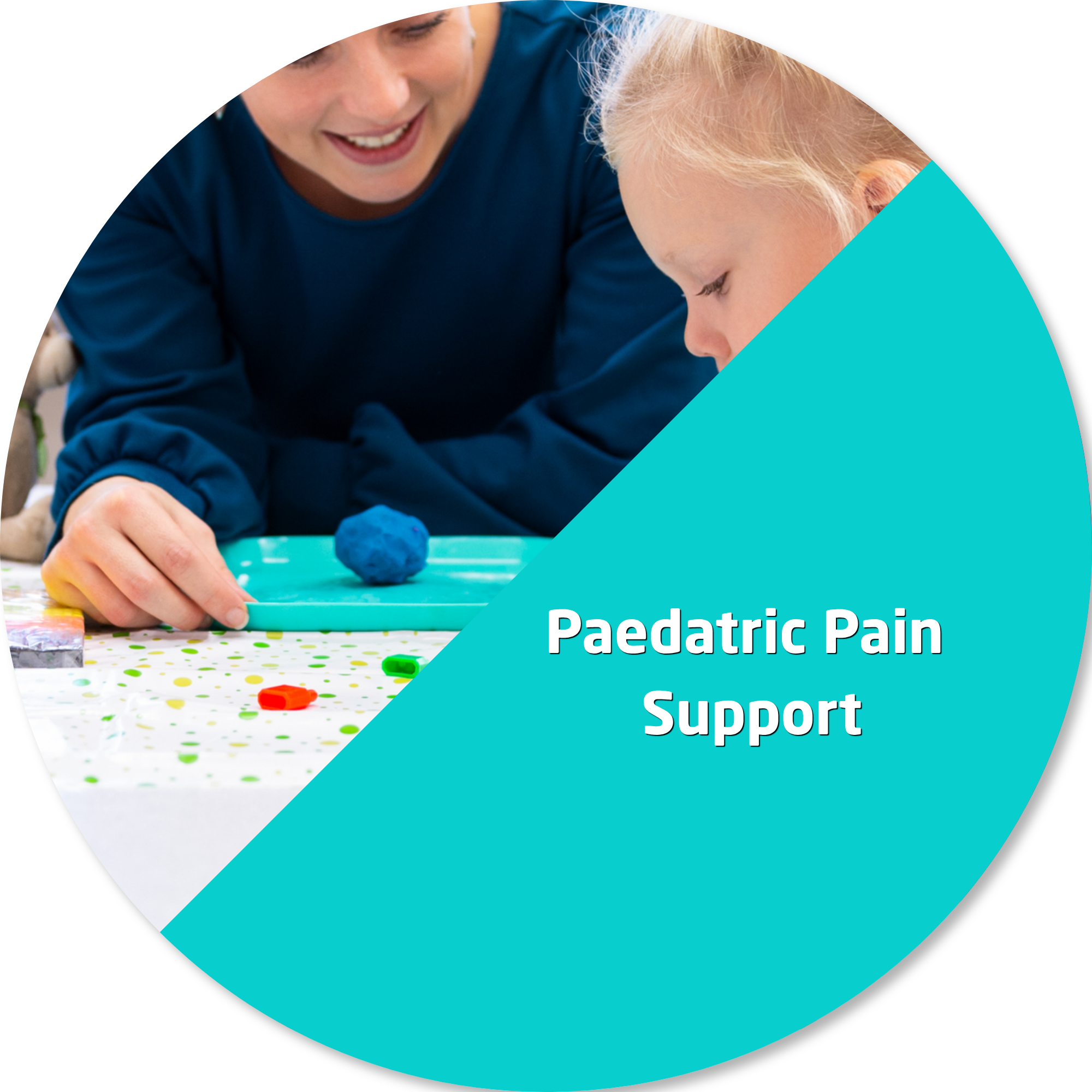 Paediatric therapist supporting a young child during a creative play activity at a table, using colourful craft materials in a bright and welcoming clinic setting.