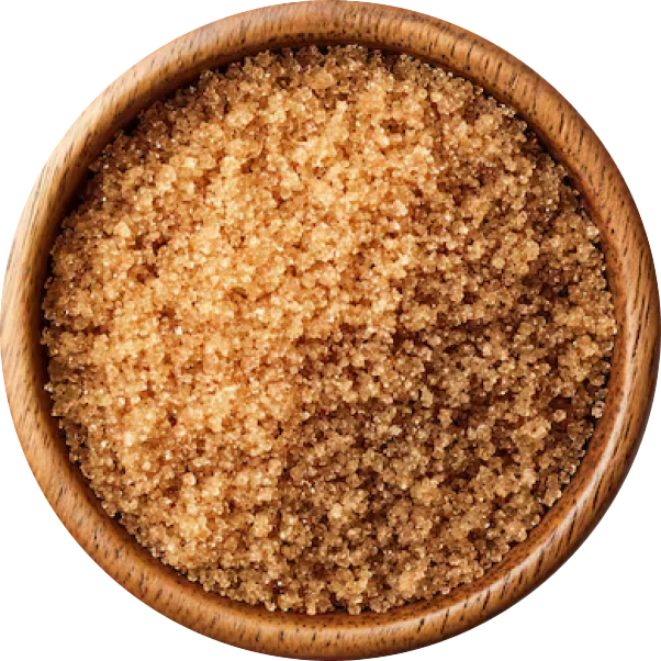 Close-up of ground cinnamon in a wooden bowl.