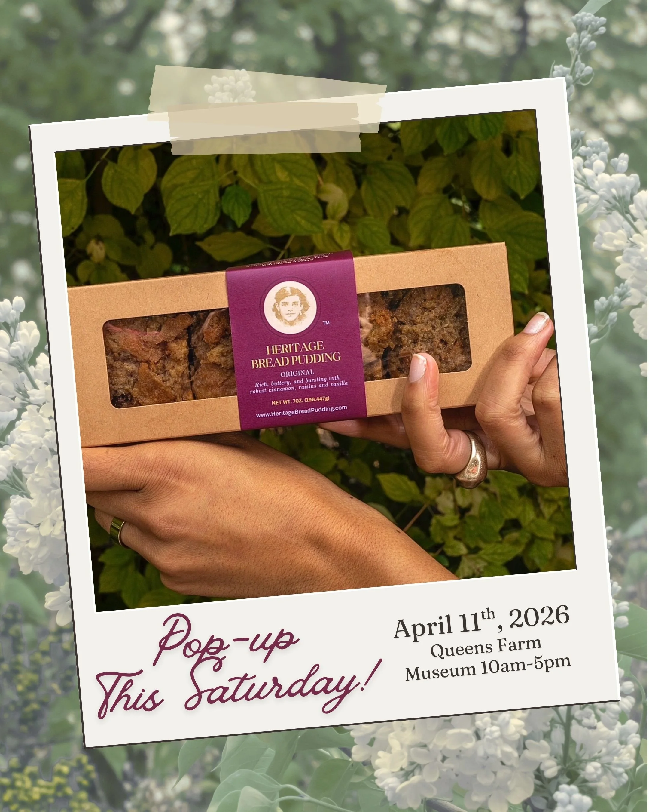 A close-up view of a person holding and displaying a flyer for a pop-up event scheduled for Saturday, April 11th, 2026, at Queens Farm Museum from 10 am to 5 pm, with flowers and greenery in the background.