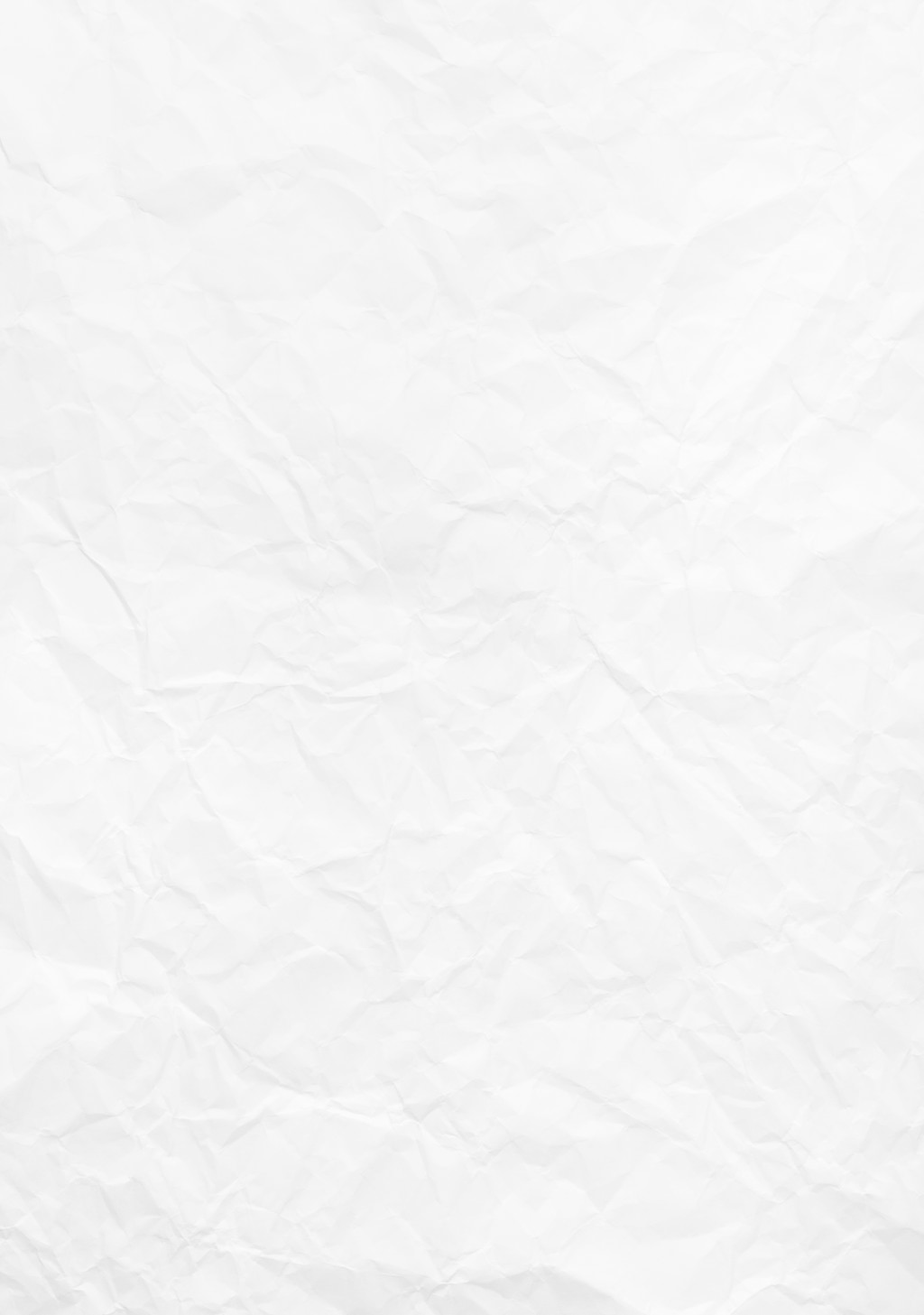 A crumpled sheet of white paper with visible folds and wrinkles.