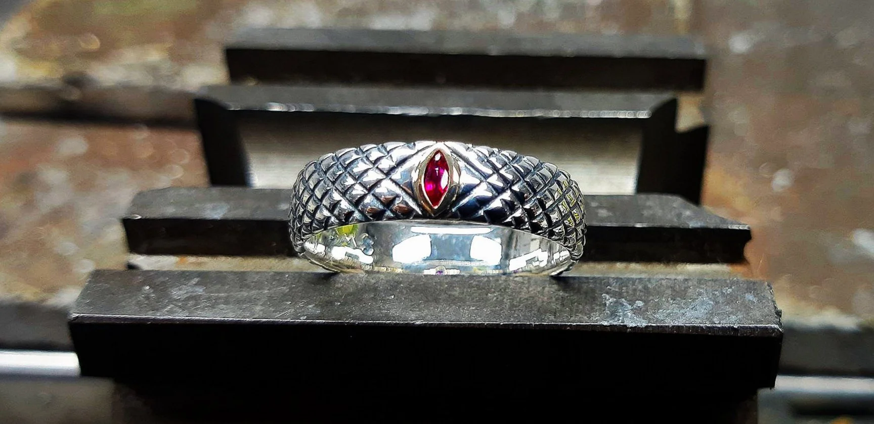 dragon scale sterling silver ring set with a ruby