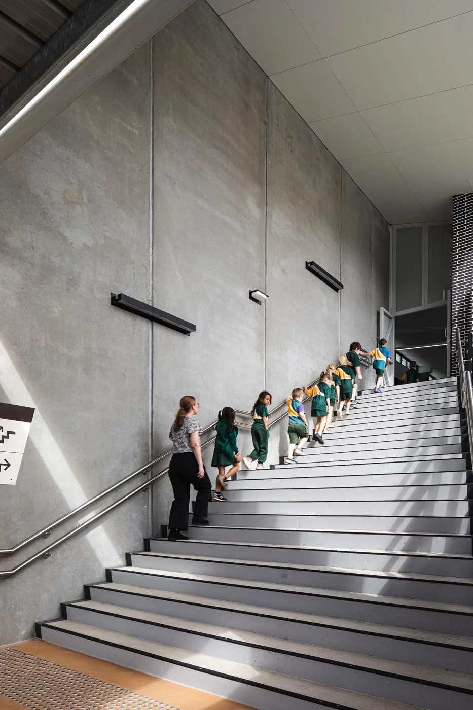 Kids walking up stairs at Kallangur State School