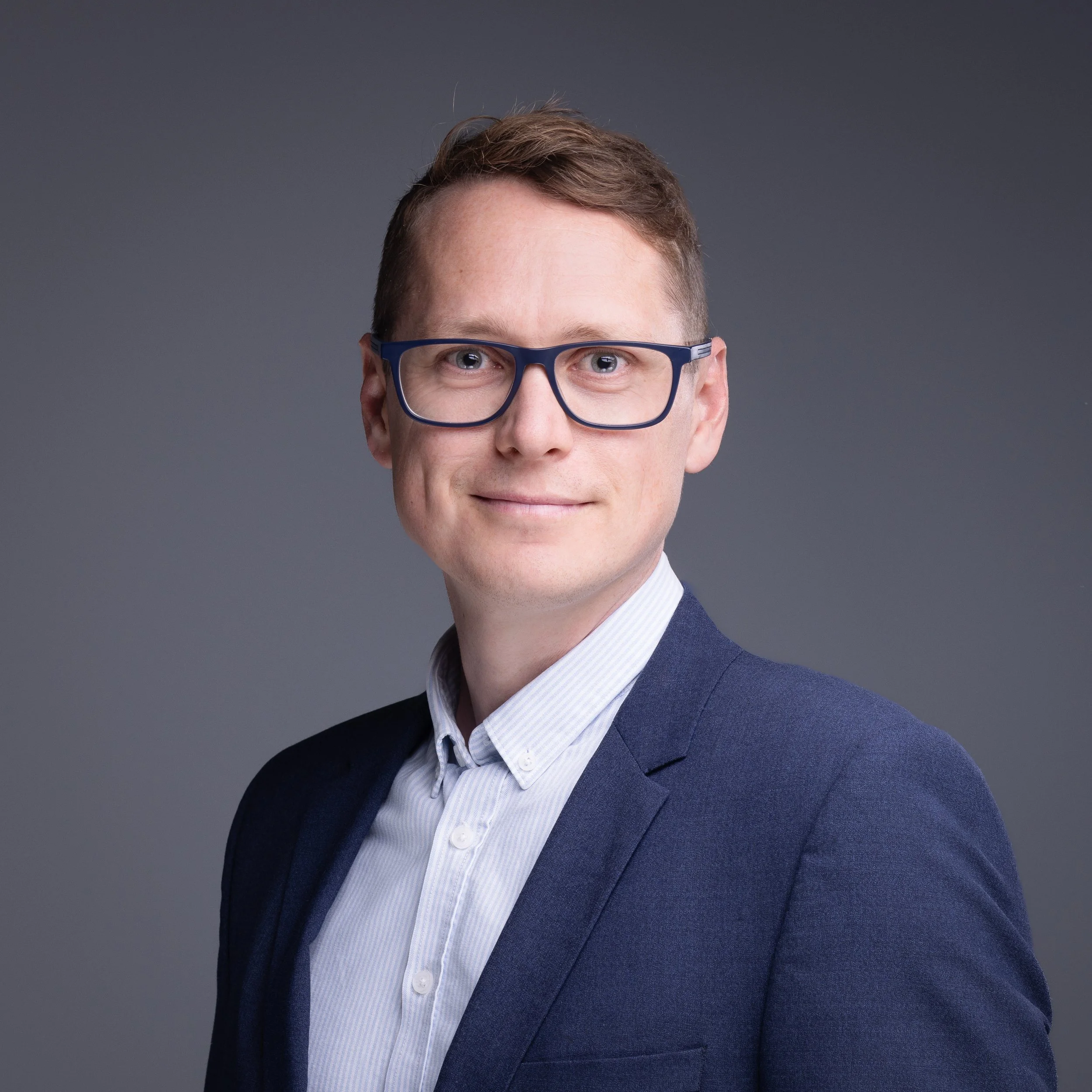 Professional leadership portrait of a senior executive photographed in London for corporate profile and board communications.