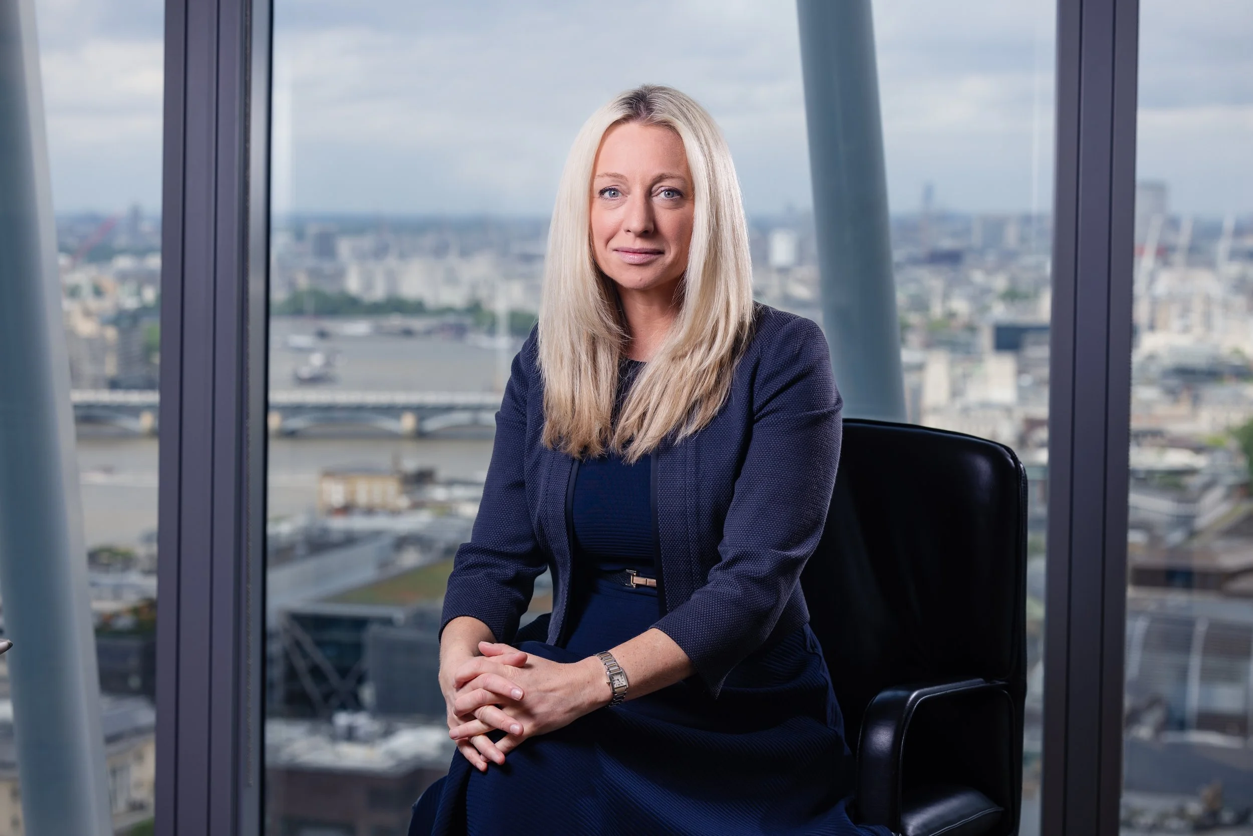 Corporate leadership portrait of a senior business professional photographed in London.