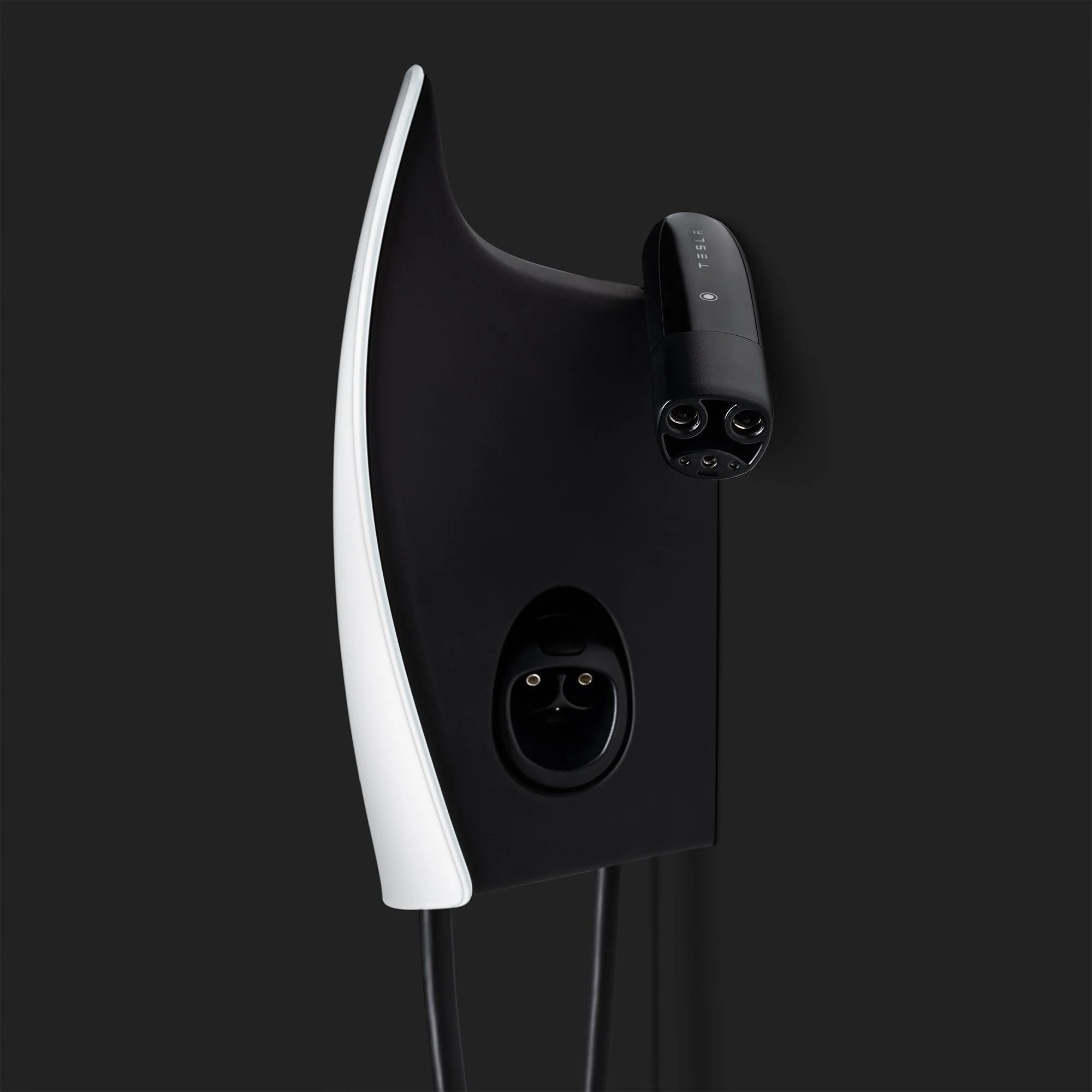 Tesla electric vehicle charging station with two charging ports on a black background.