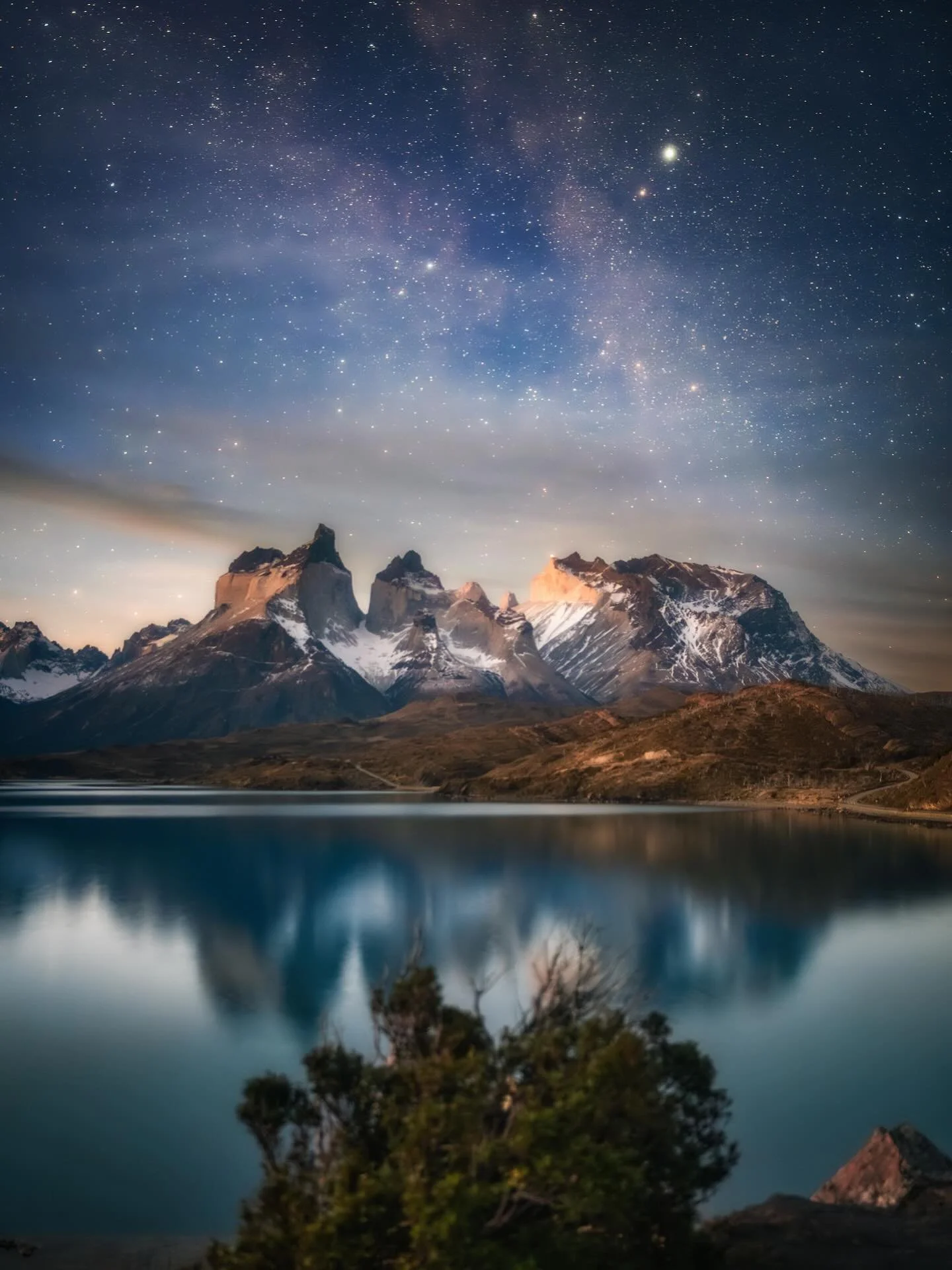 When Twilight Hits Patagonia ✨

Another dreamy scene from the famous Lago Peho&eacute;, looking toward the iconic peaks of Patagonia. Above, the sky glows in a soft twilight blue, clear and serene. This photo is a single, unblended shot captured just