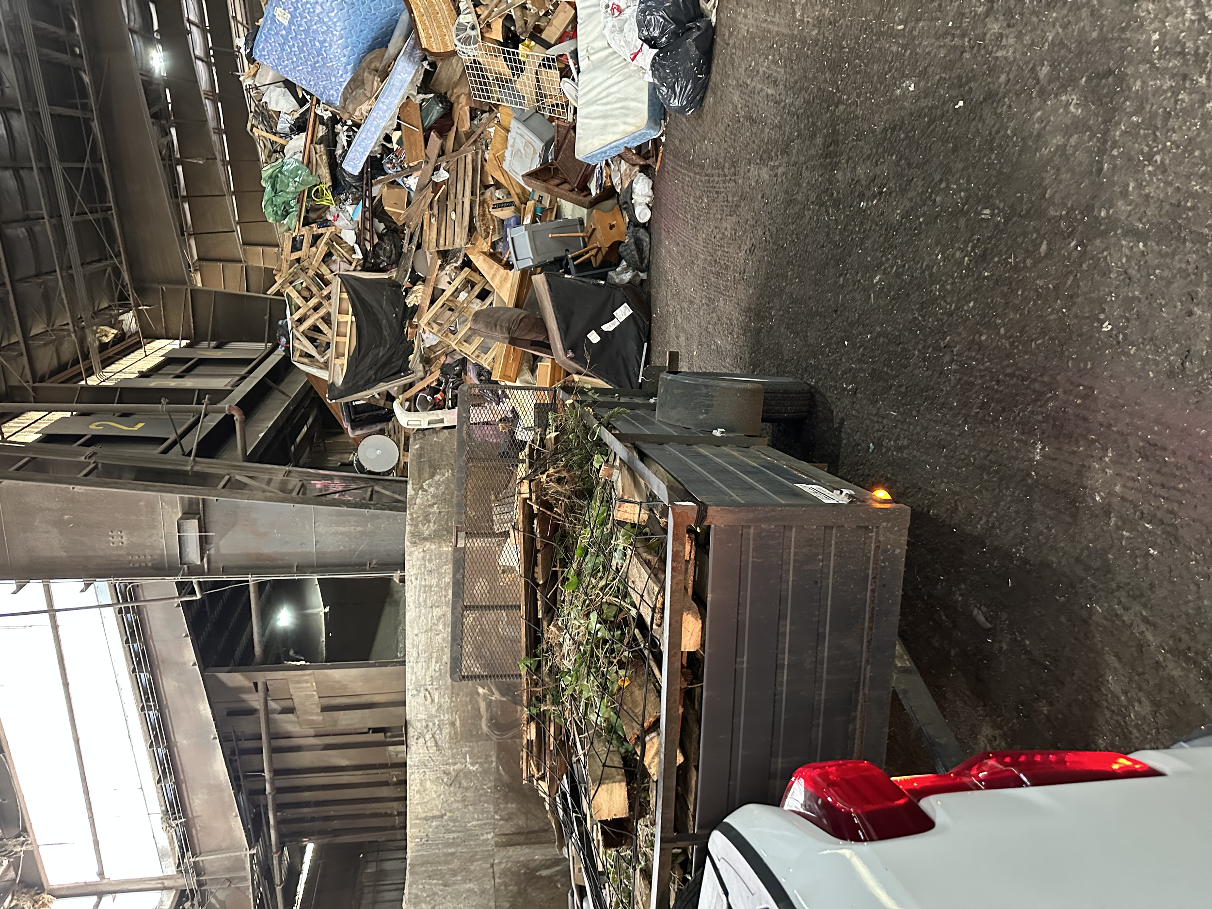 Loaded trailer with yard debris and branches at the landfill – Pierce County WA