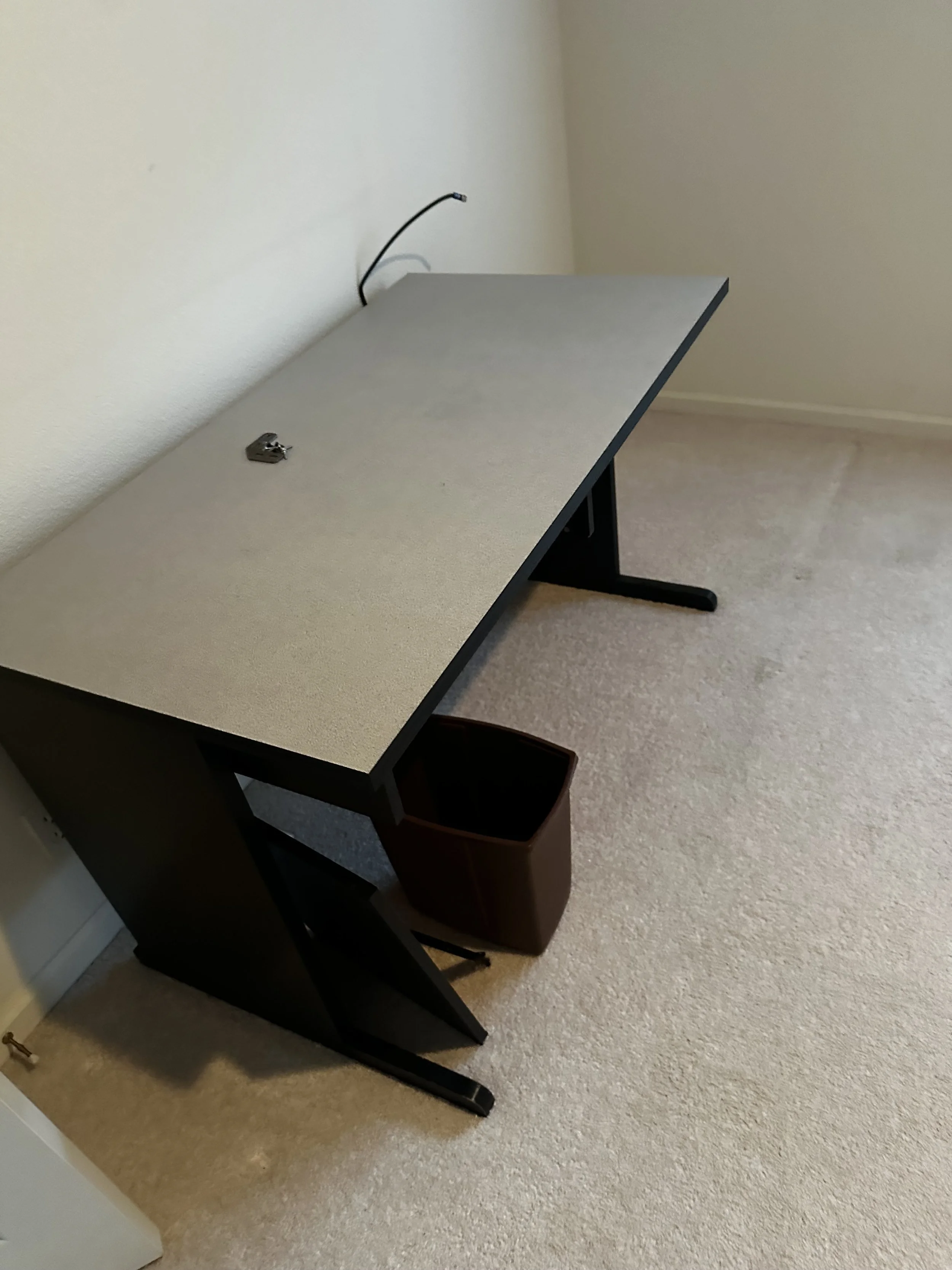 Before — Desk and misc items needing removal.