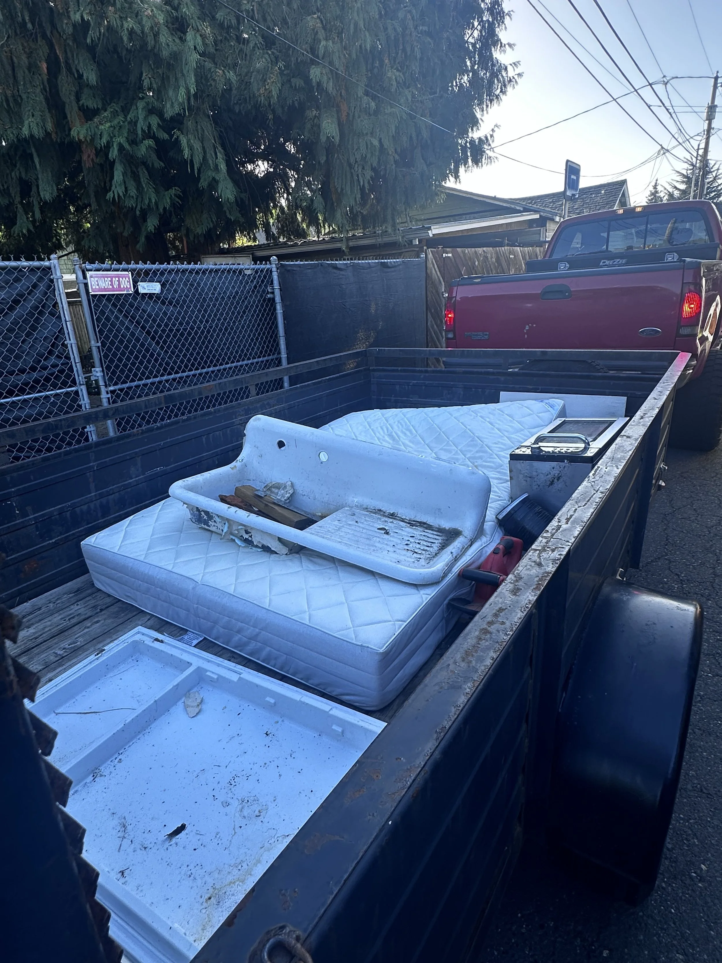 After junk loaded trailer Auburn WA