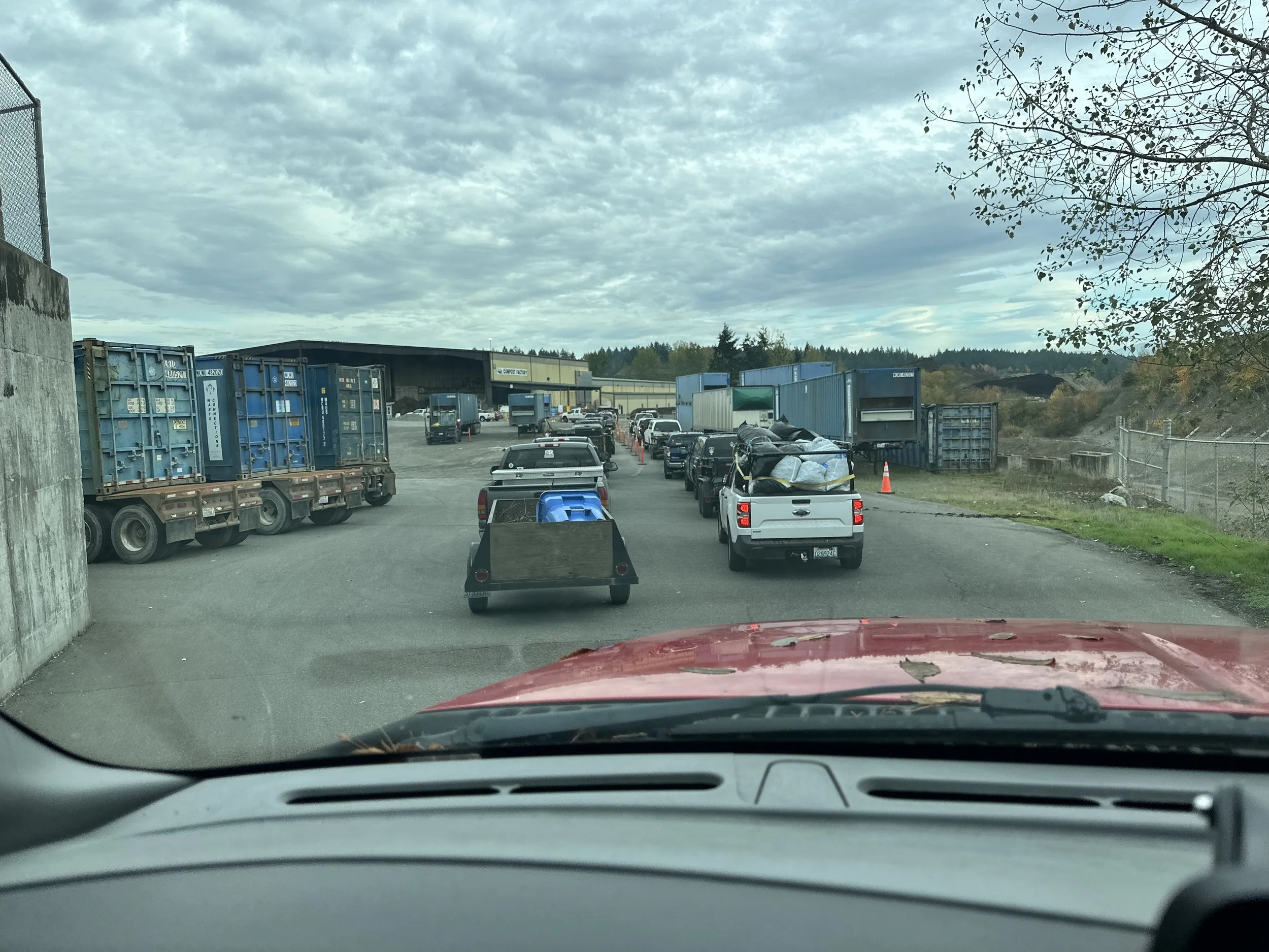Trailer loaded with branches and green waste waiting in the long line at the Puyallup transfer station.