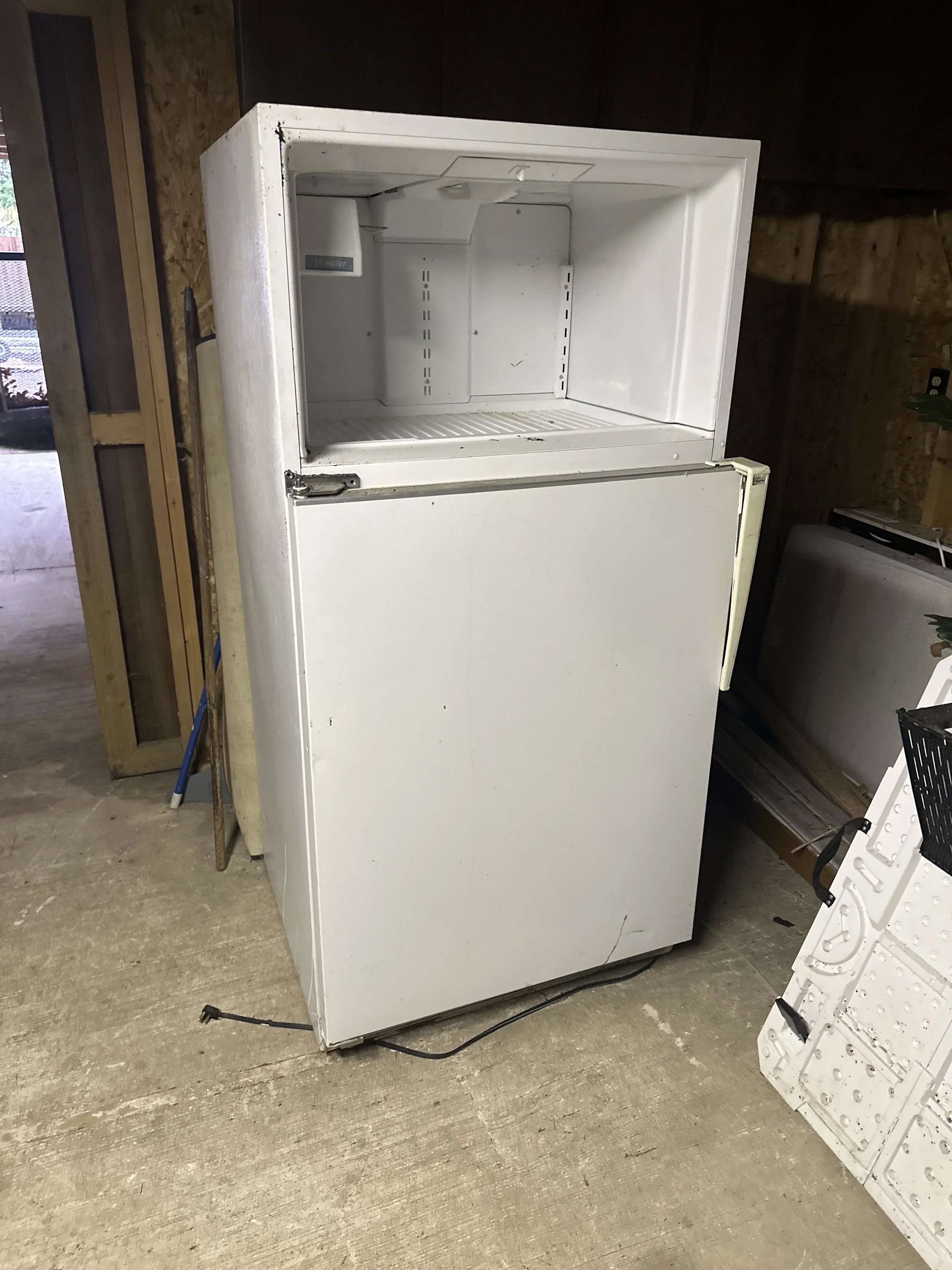 Before refrigerator removal and junk pickup Pierce County WA