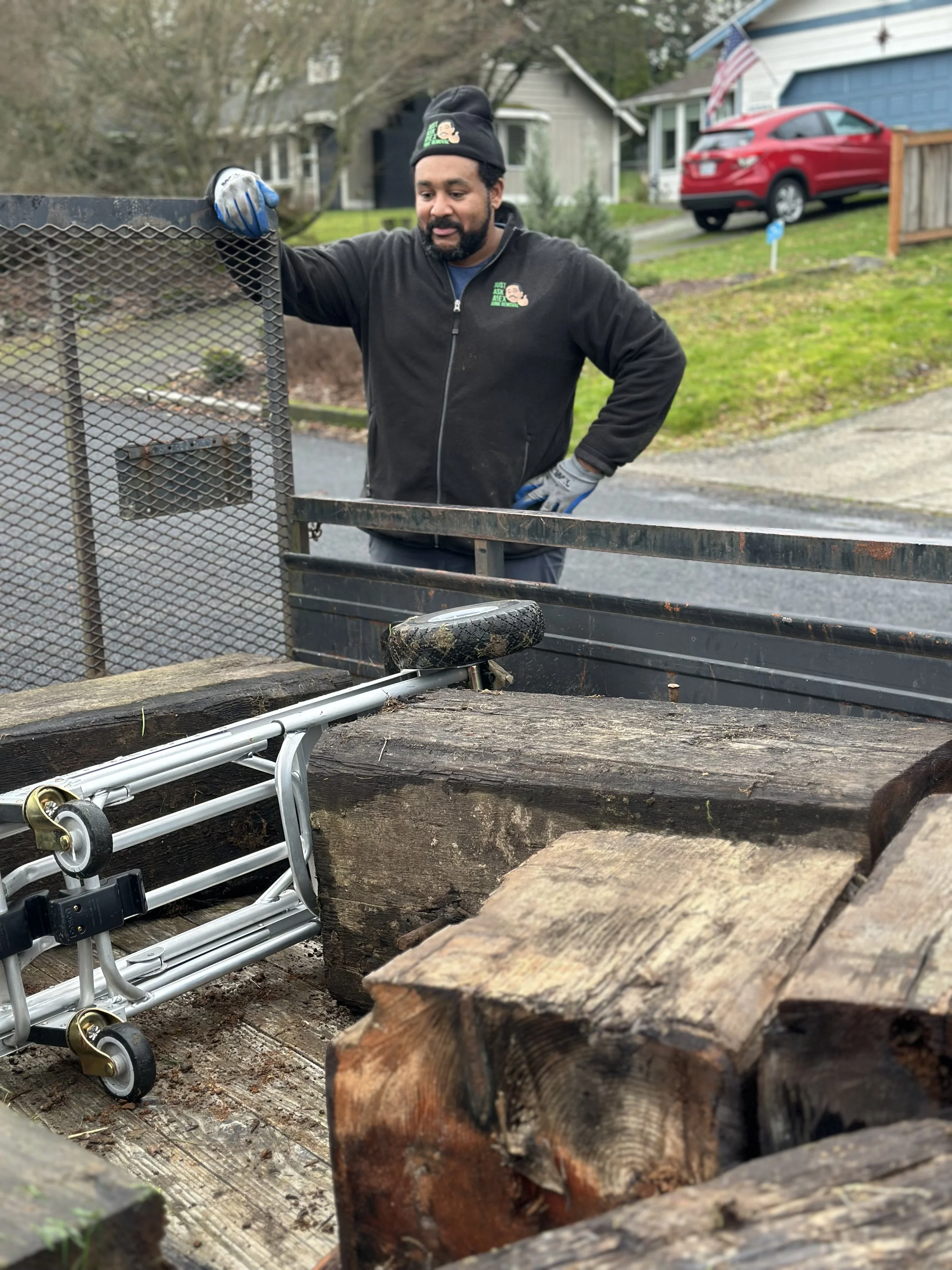 Heavy demo debris loaded and secured for haul-off — leave the back-breaking work to us. Pierce County, WA.