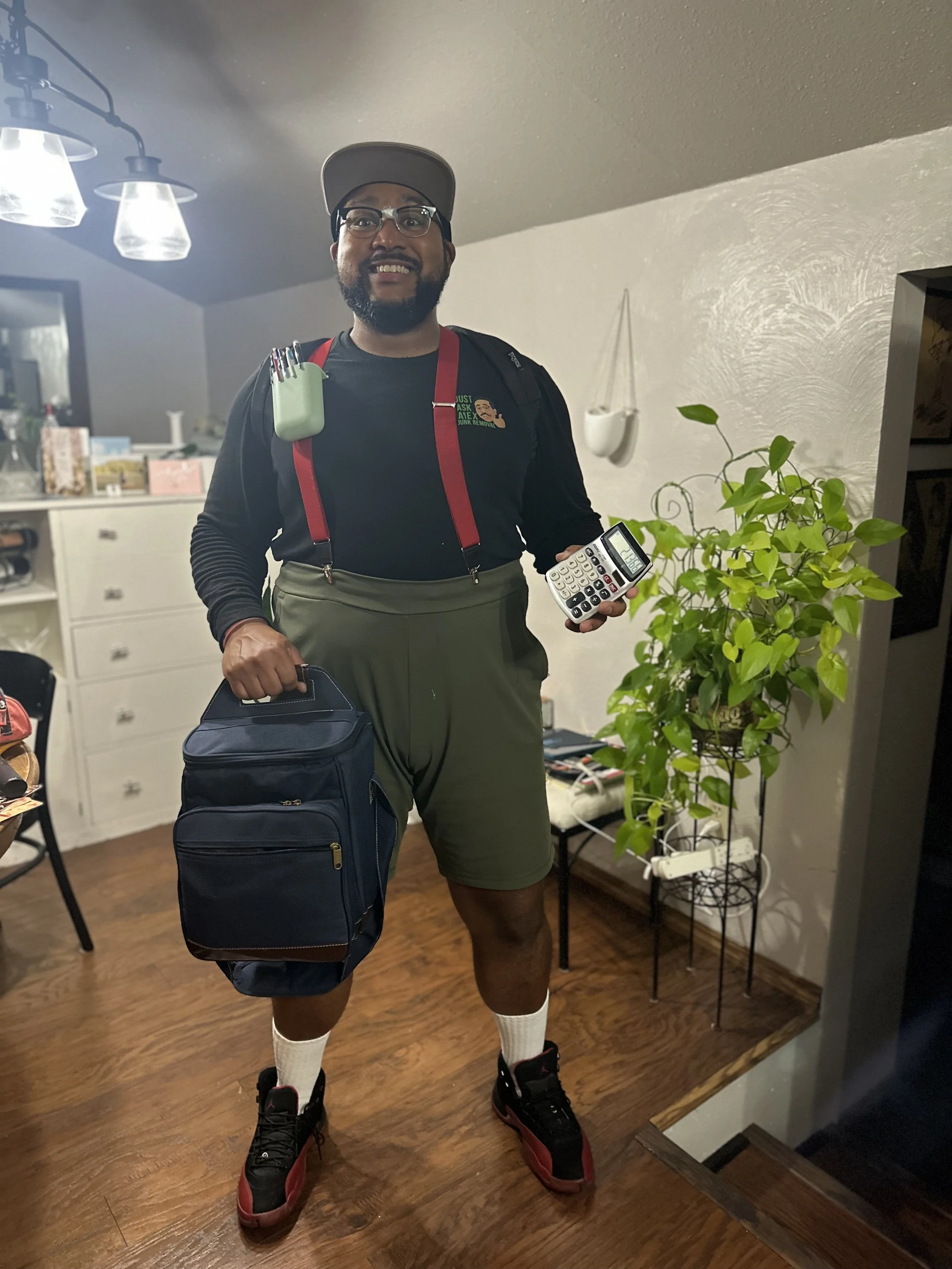 Junk removal professional from Just Ask Alex Junk Removal providing an on-site estimate and organizing disposal logistics.