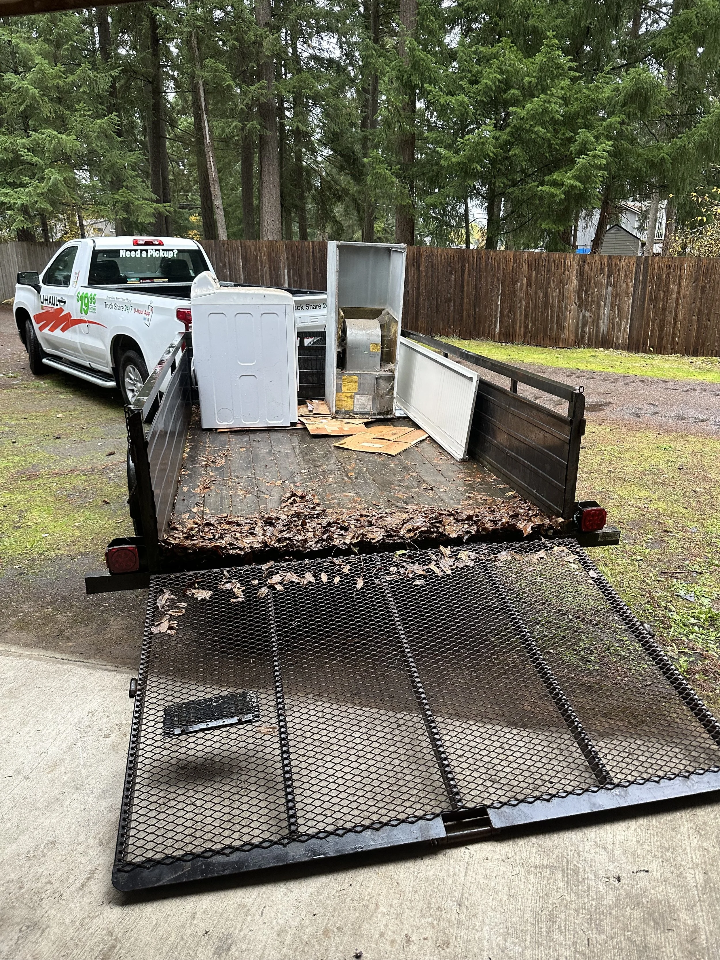 Progress junk loading into trailer Pierce County WA