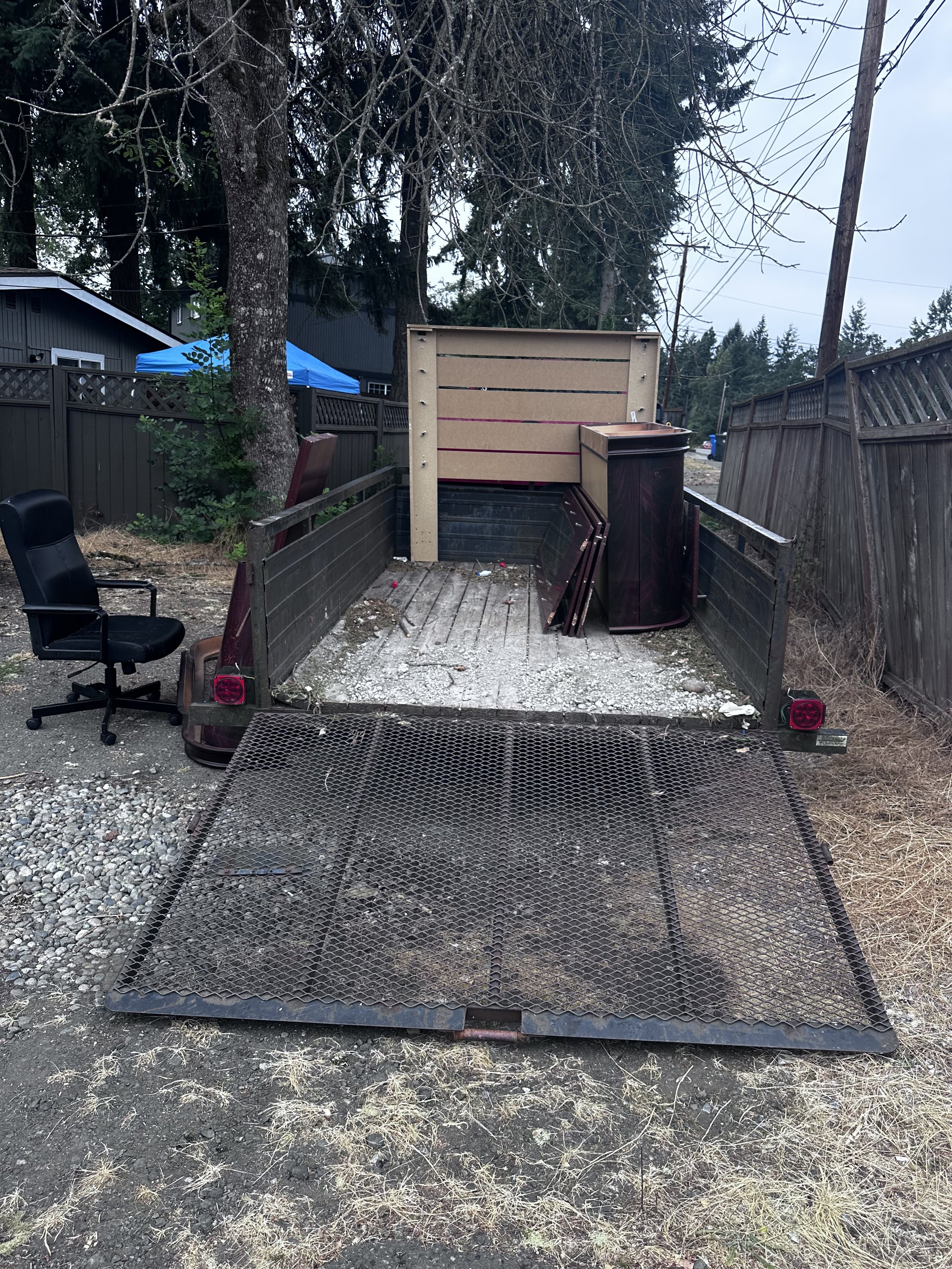 Progress loading junk trailer Pierce County WA