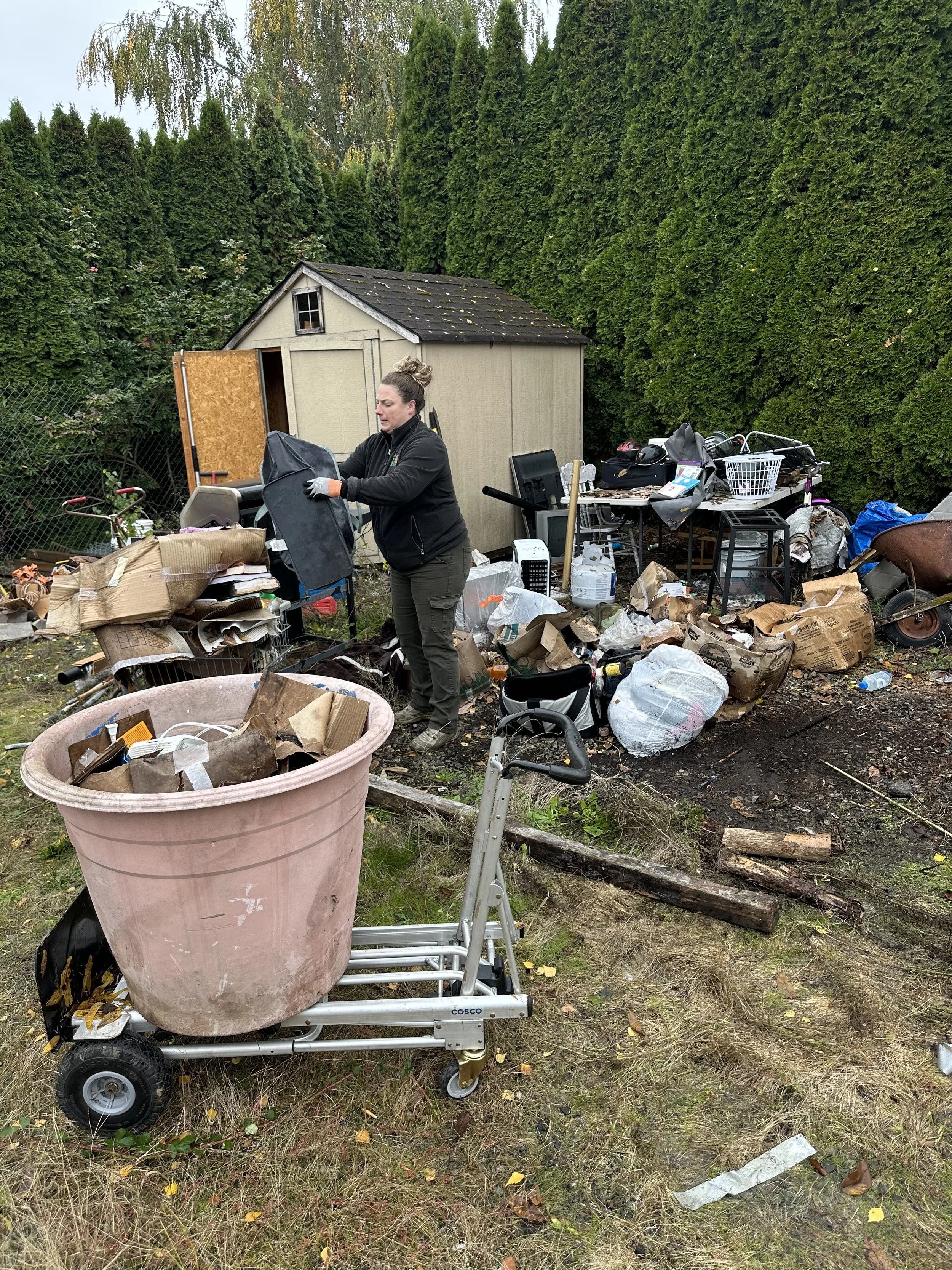 DAY 2 — Sorting and loading debris into buckets as we restart the lot clearing.