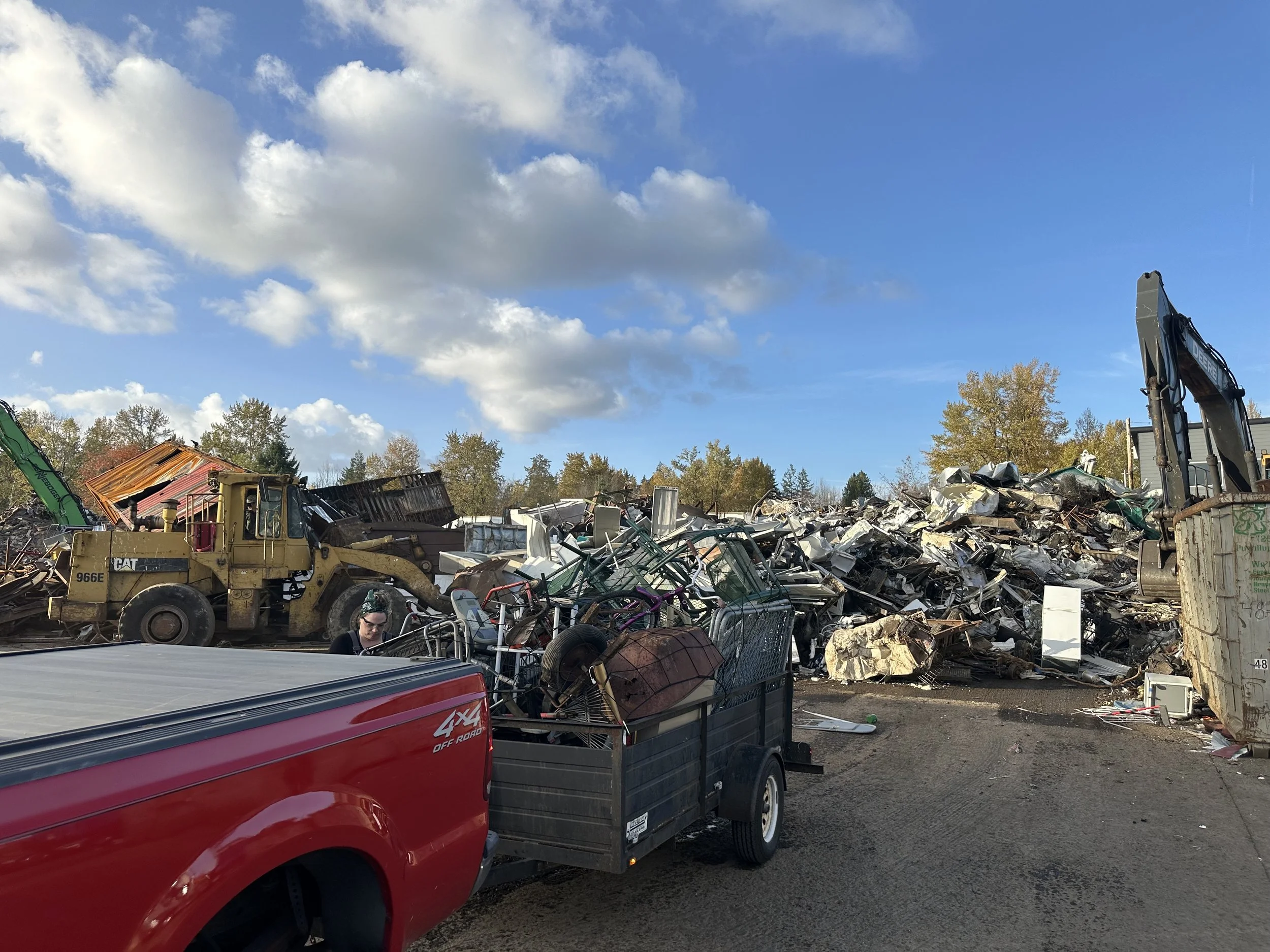 Construction debris and mixed metal being sorted for recycling at Recycling Resources facility in Tacoma, WA