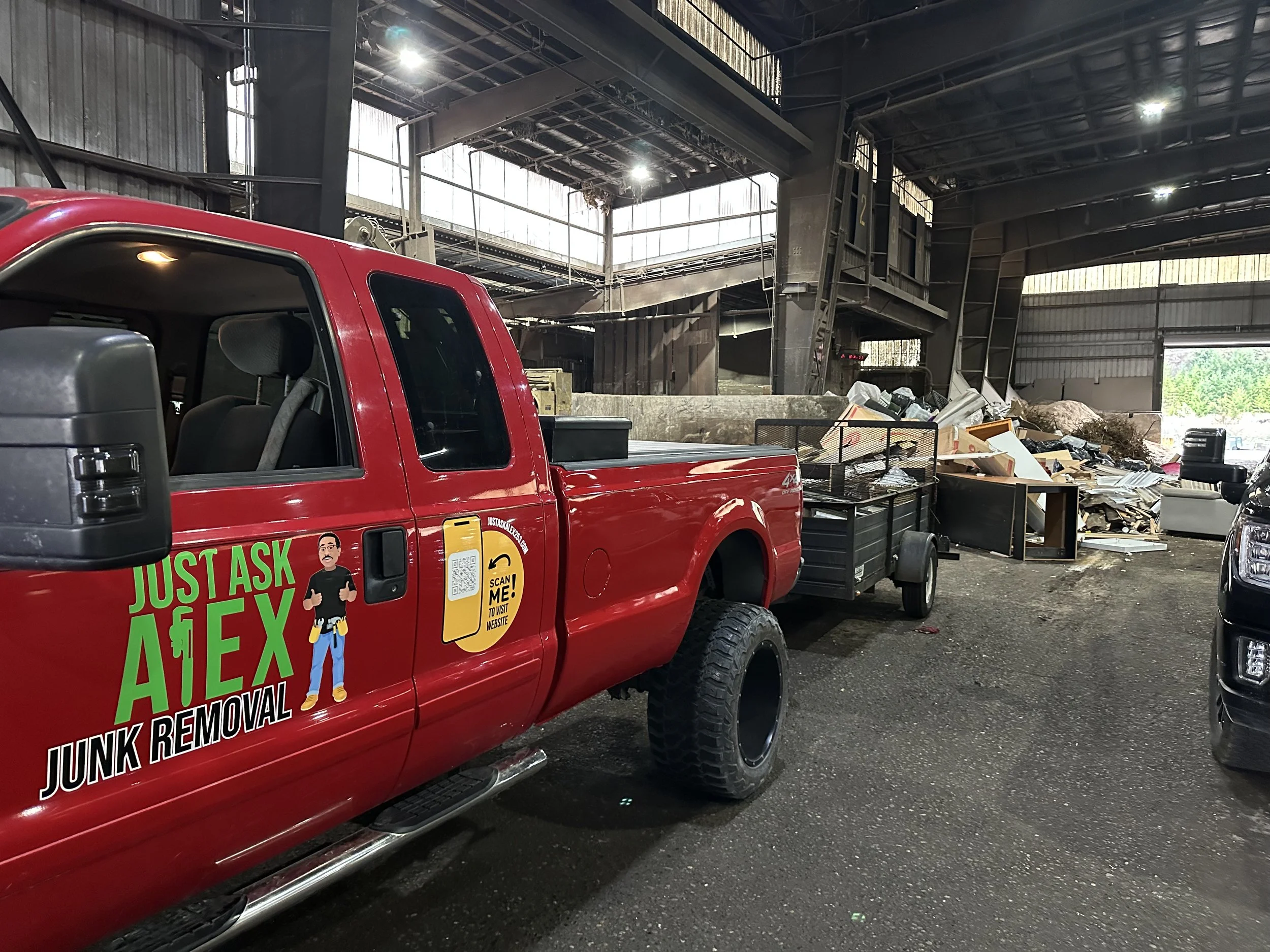 Just Ask Alex Junk Removal truck and trailer unloading household junk and hazardous waste at LRI Hidden Valley Transfer Center in Puyallup, Pierce County, WA.