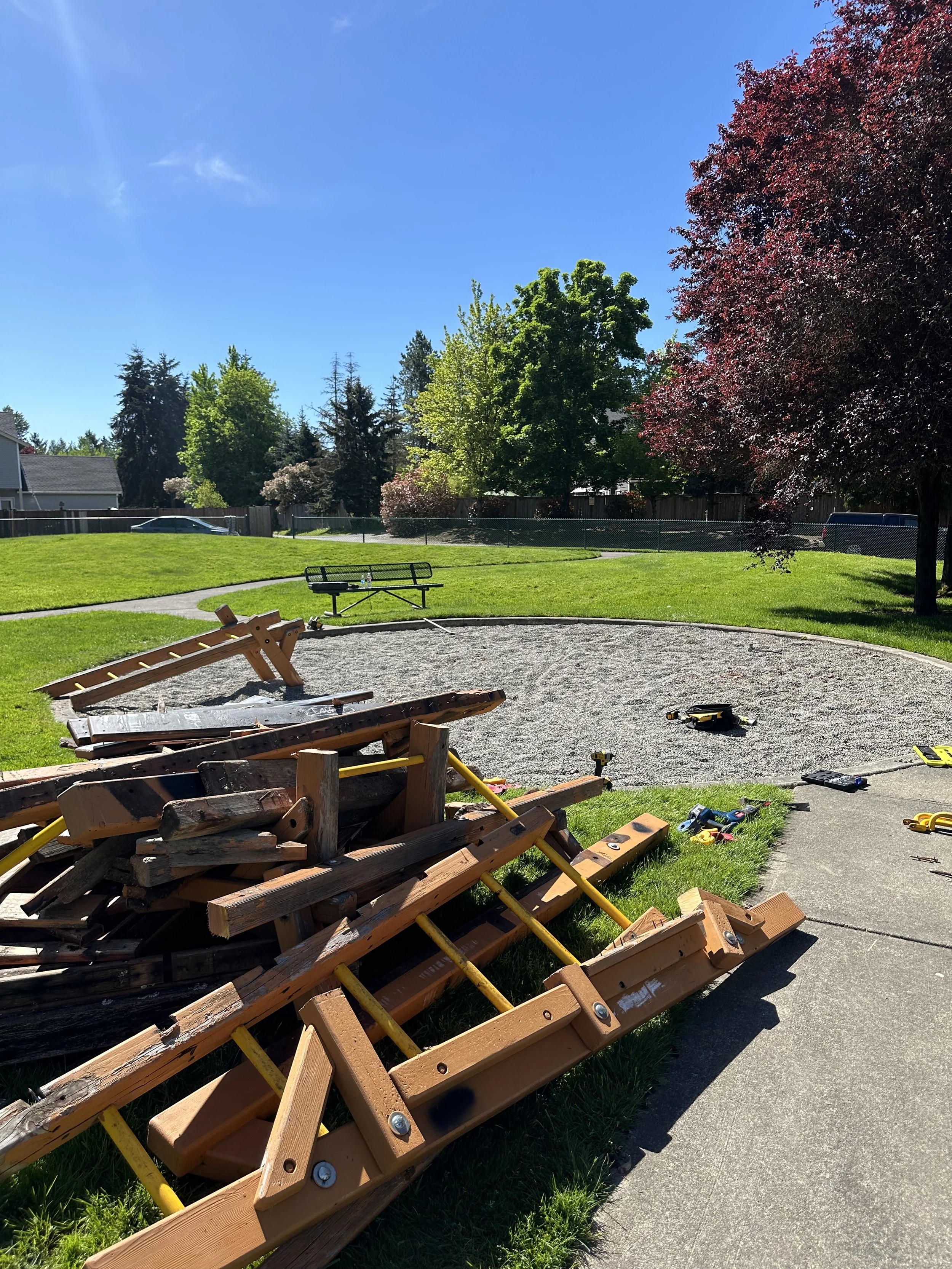 Material removal — dismantled lumber sorted for haul-off, Puyallup WA.