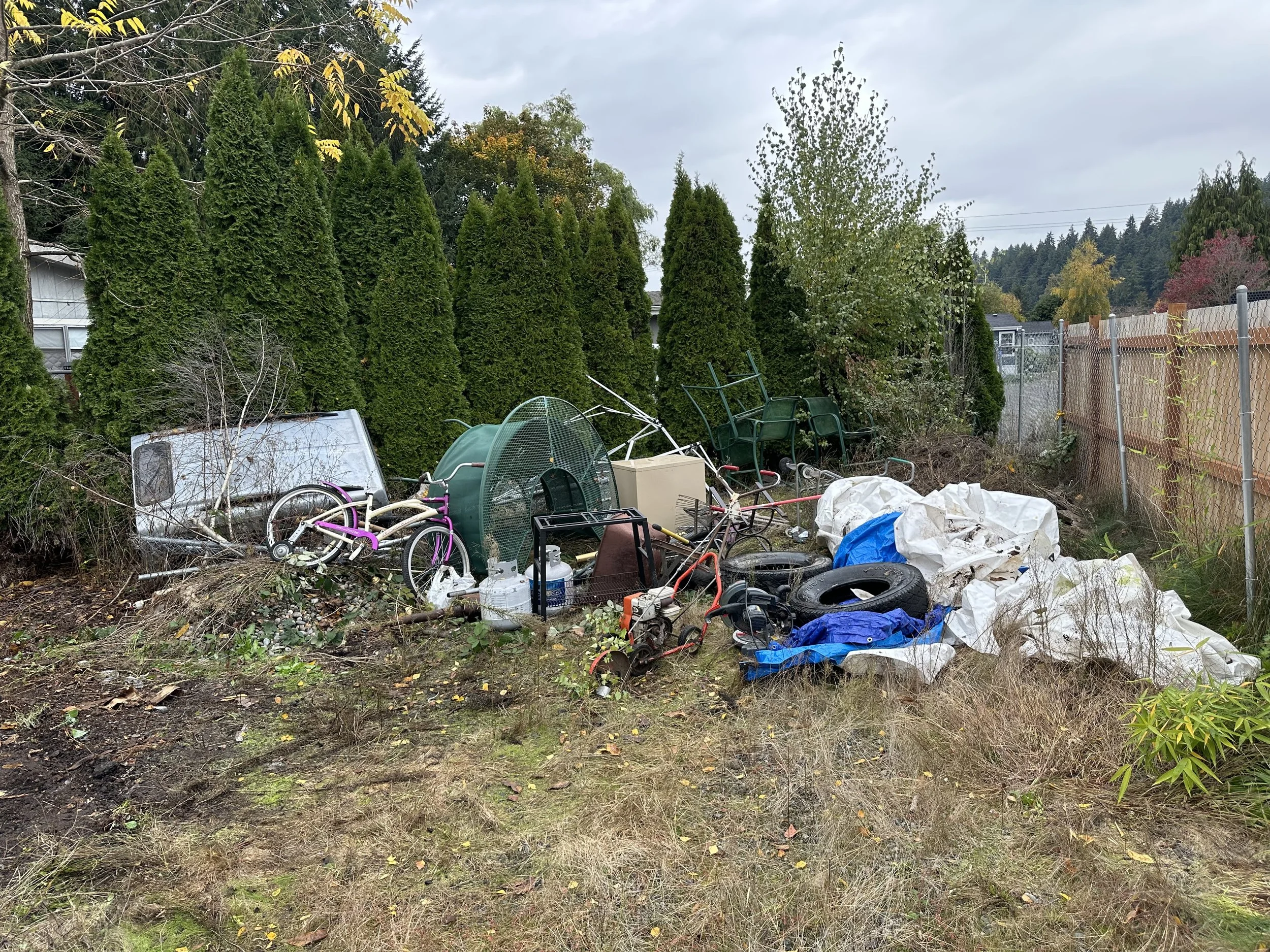 DAY 2 — Back corner fully exposed and ready for removal.