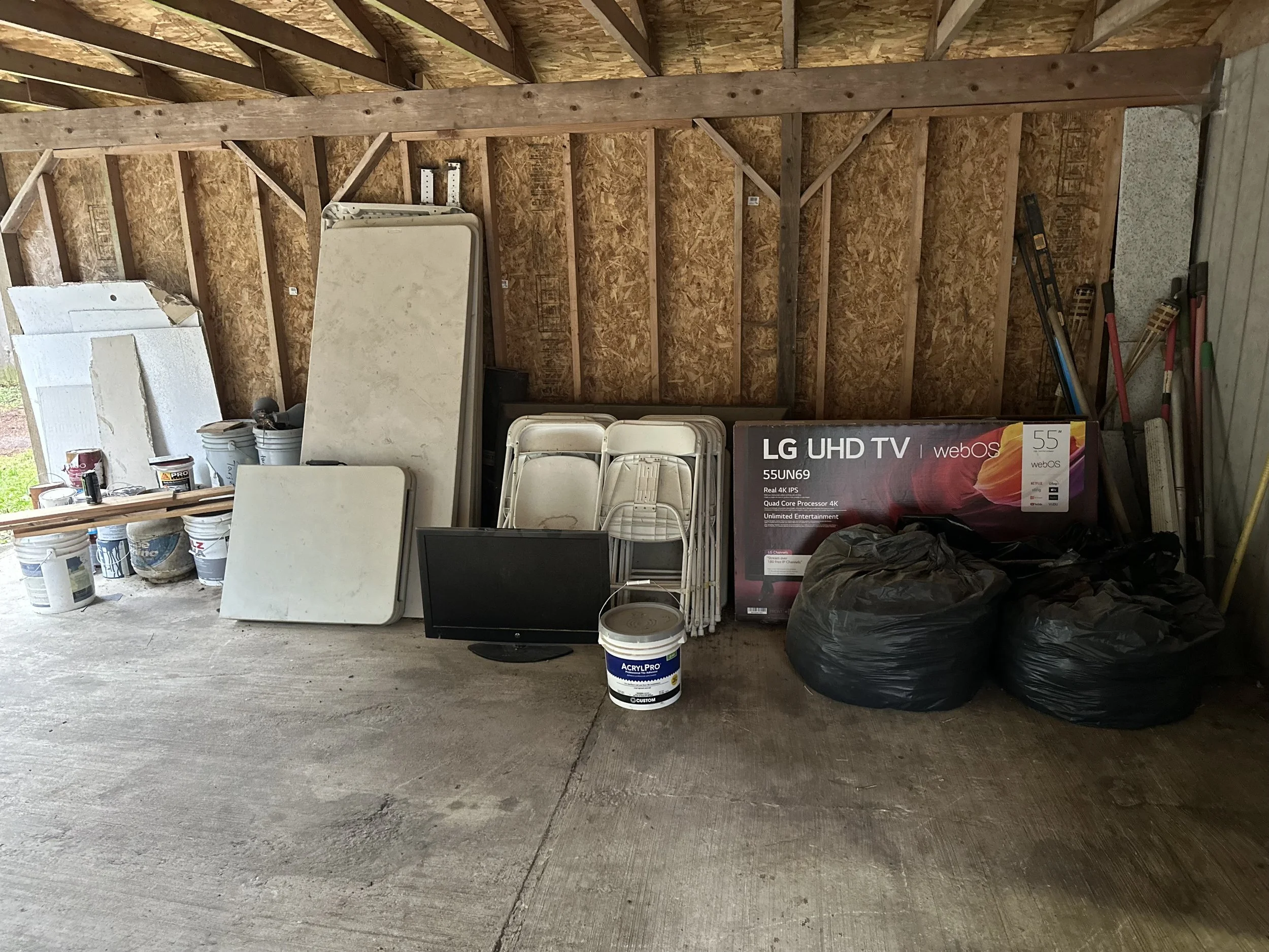 Before wall of carport clean-out Pierce County WA