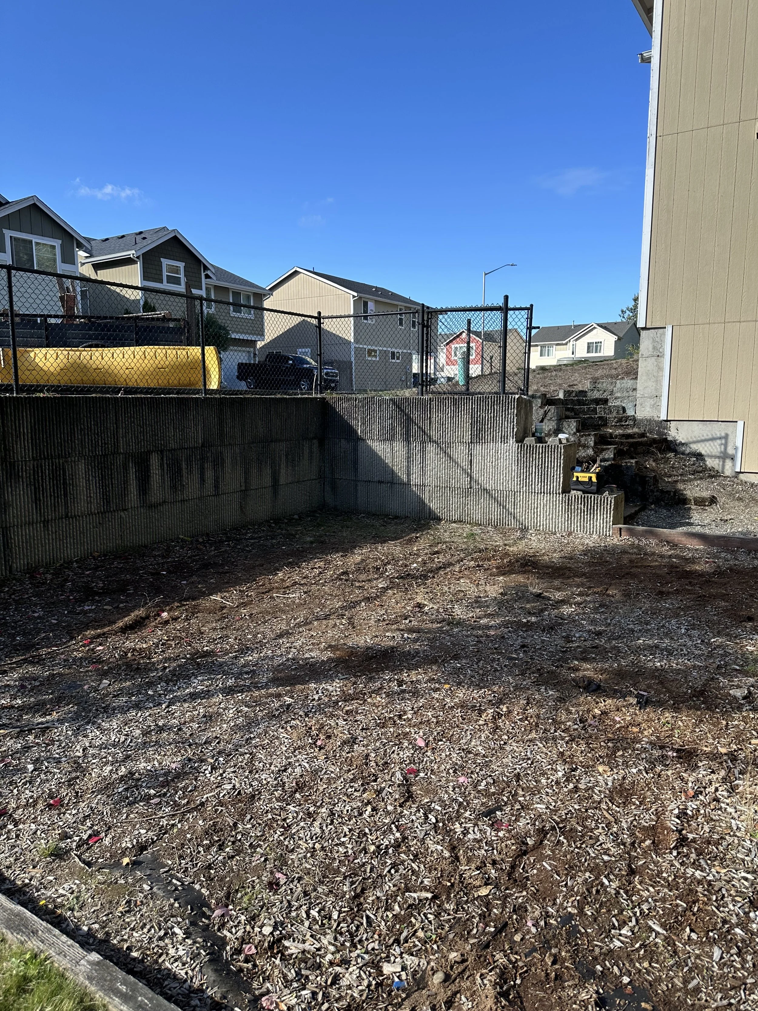 After tear-out — Wide view showing a fully cleared and safe open area, Tacoma WA.