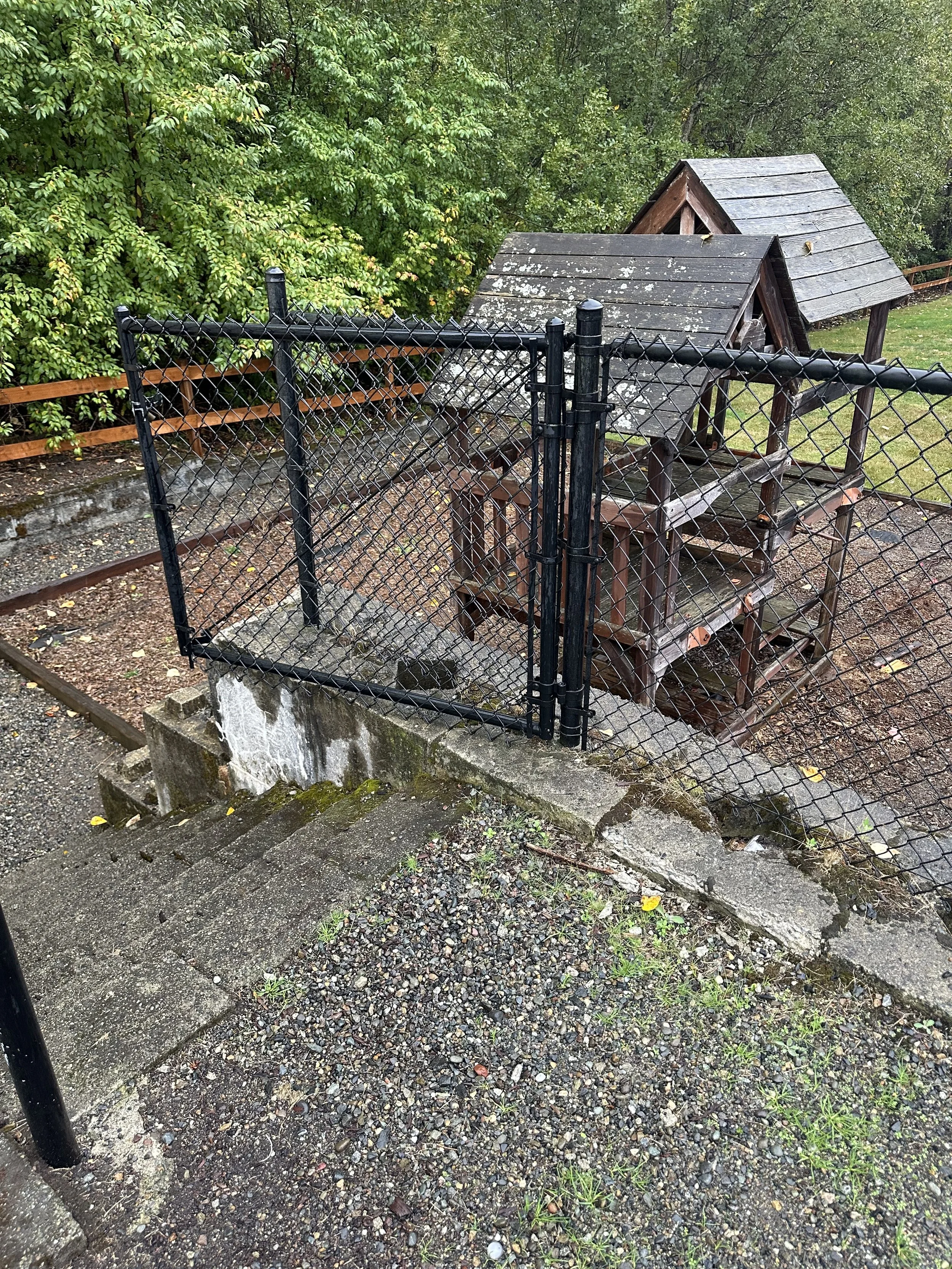 Before tear-out — Another view showing the unsafe, deteriorated wooden playset, Tacoma WA.