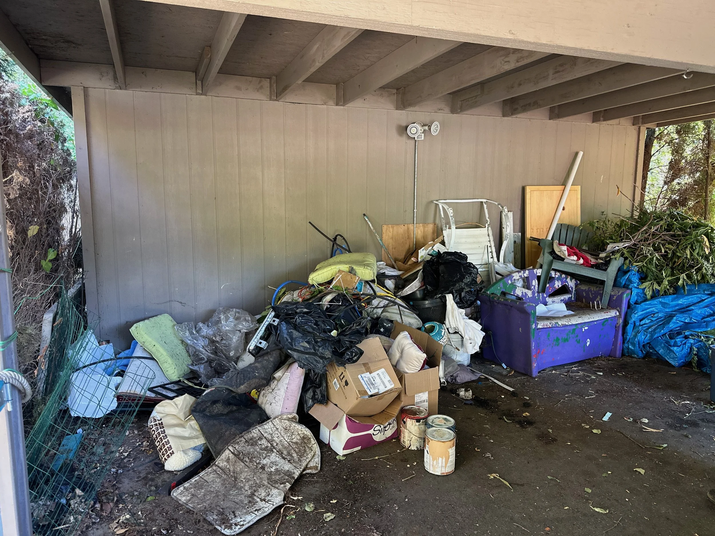 Before carport trash clean-out Puyallup WA