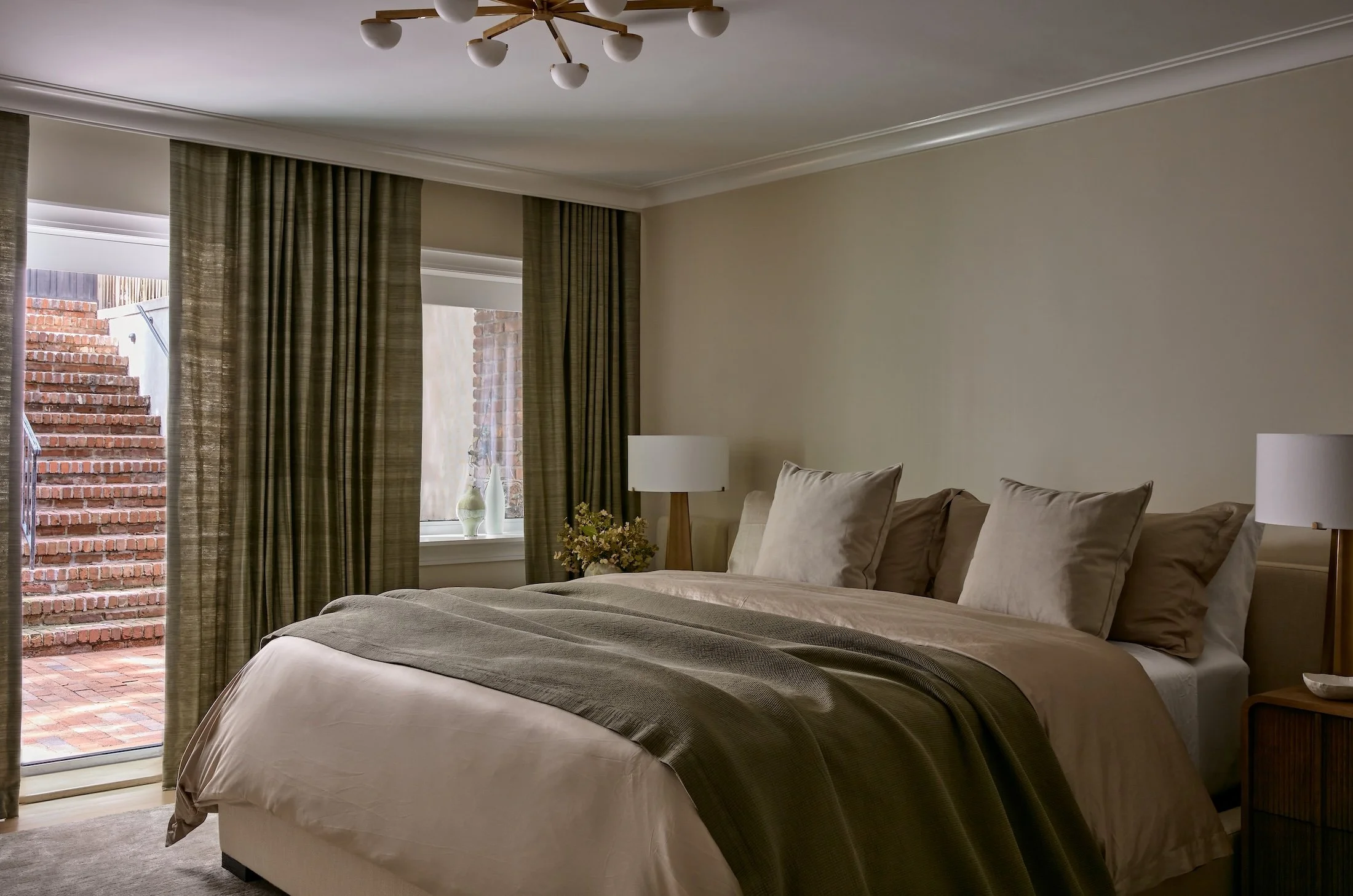 New-York-Renovations-Architecture-and-Interior-Renovation-West-22nd-Bedroom-Olive-Curtains-Linen-Bedding-Balcony.jpg