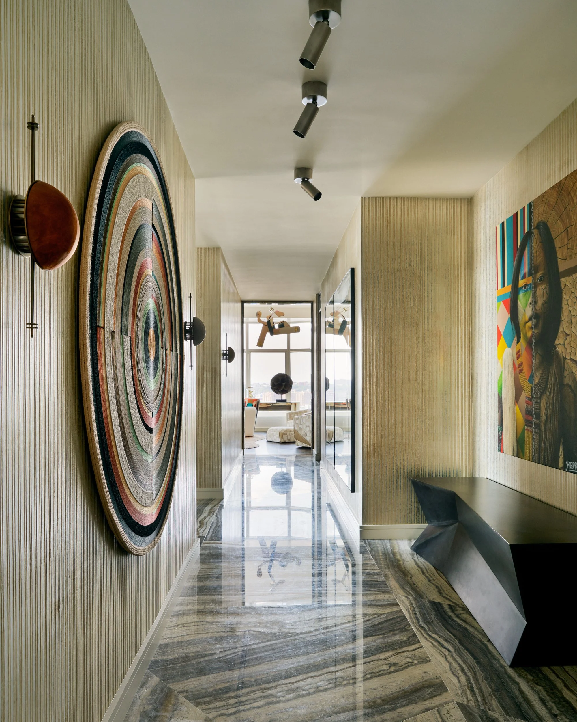 New-York-Renovations-Architecture-and-Interior-Renovation-West-18th-Entry-Hallway-Circular-Wall-Art-Marble-Floor.jpg