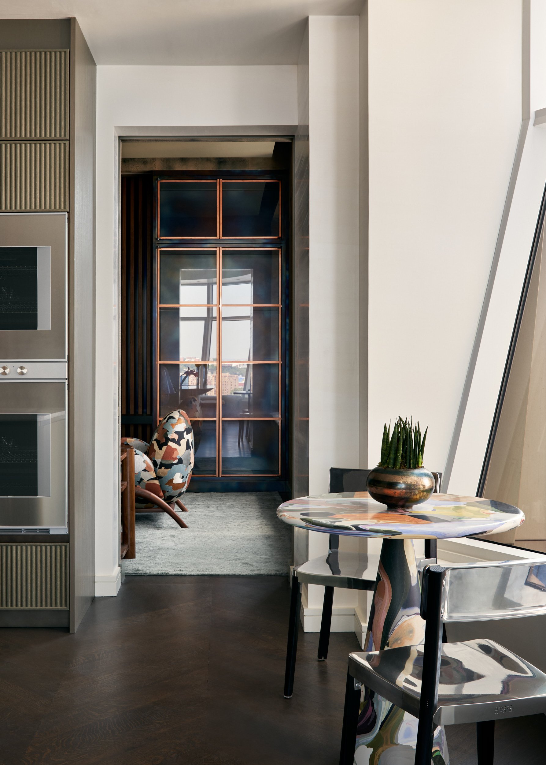 New-York-Renovations-Architecture-and-Interior-Renovation-West-18th-Kitchen-Hallway-Copper-Glass-Door-Round-Table.jpg