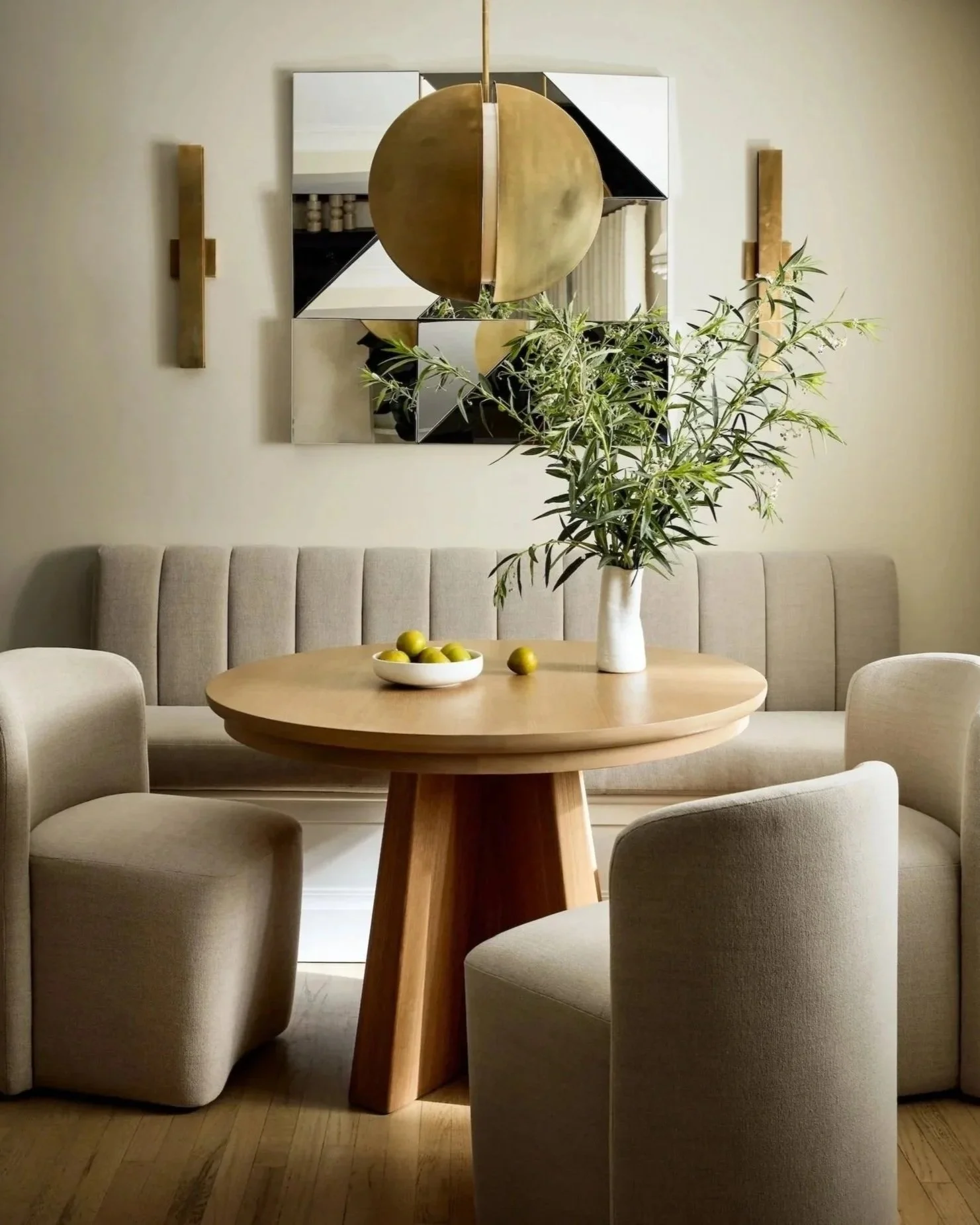 New-York-Renovations-Architecture-and-Interior-Renovation-West-22nd-Dining-Nook-Round-Table-Brass-Pendant-Geometric-Art.jpg