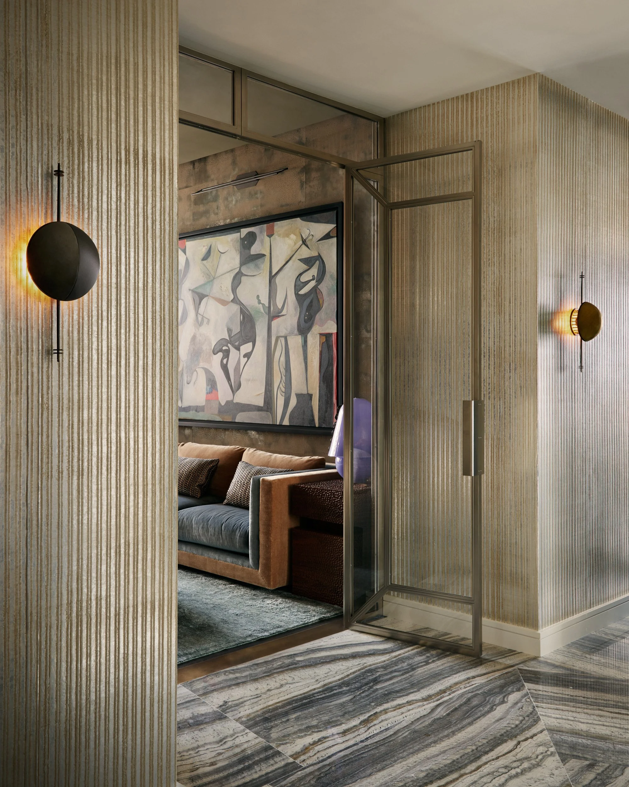 New-York-Renovations-Architecture-and-Interior-Renovation-West-18th-Hallway-Glass-Pivot-Door-Wall-Sconces.jpg