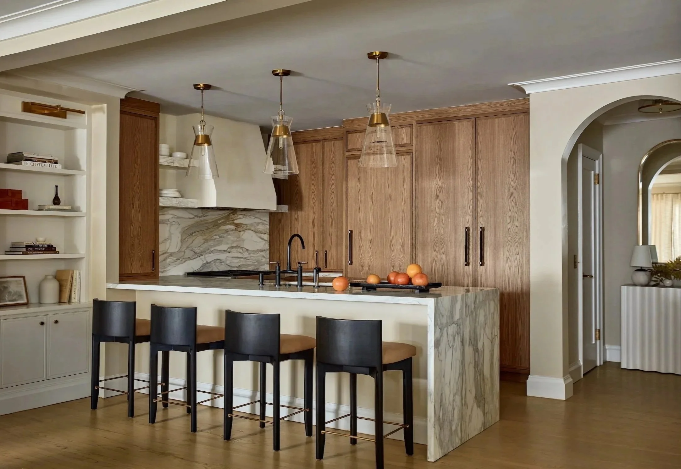 New-York-Renovations-Architecture-and-Interior-Renovation-West-22nd-Kitchen-Wood-Cabinets-Marble-Island-Black-Barstools.jpg