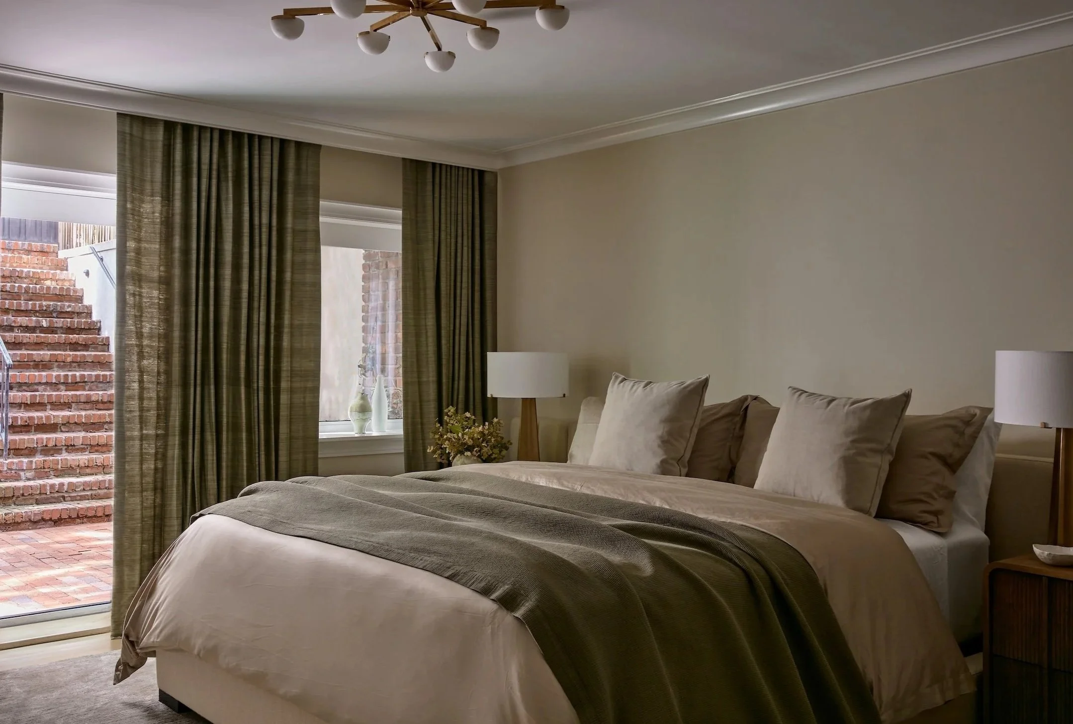 New-York-Renovations-Architecture-and-Interior-Renovation-West-22nd-Bedroom-Olive-Curtains-Linen-Bedding-Balcony.jpg