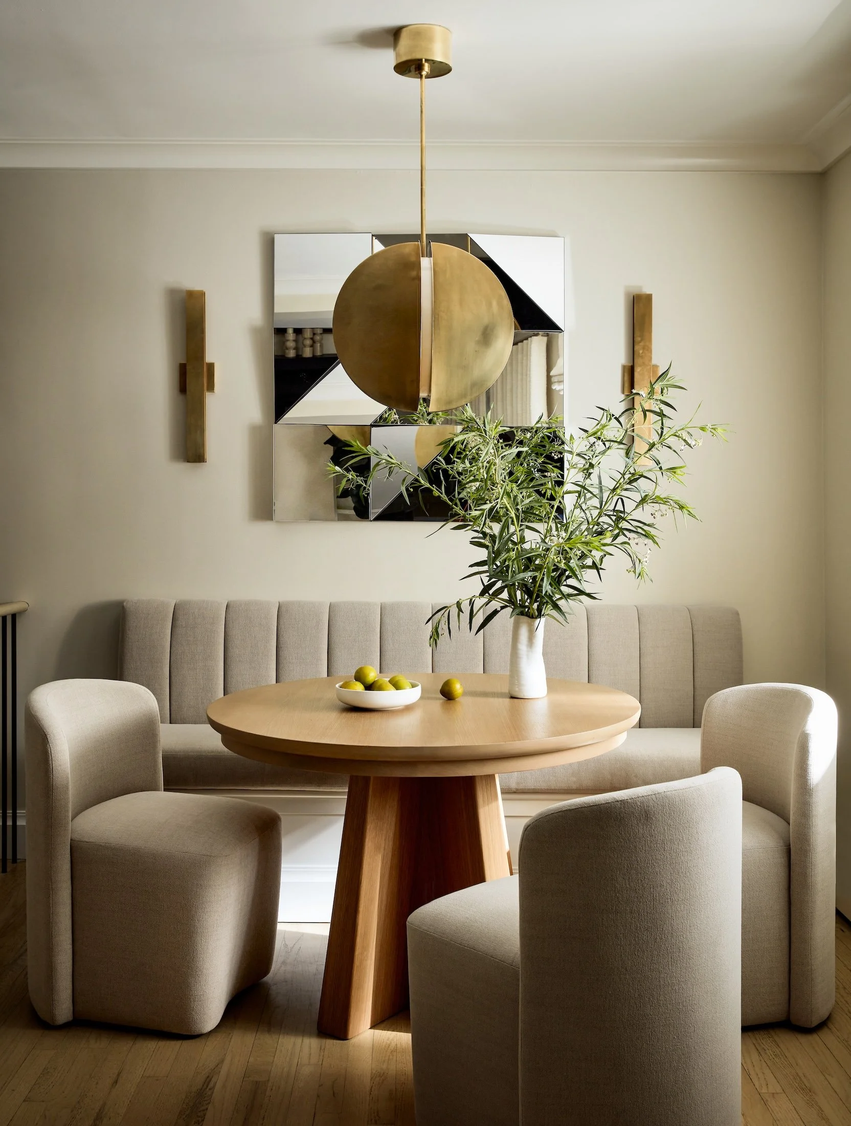 New-York-Renovations-Architecture-and-Interior-Renovation-West-22nd-Dining-Nook-Round-Table-Brass-Pendant-Geometric-Art.jpg