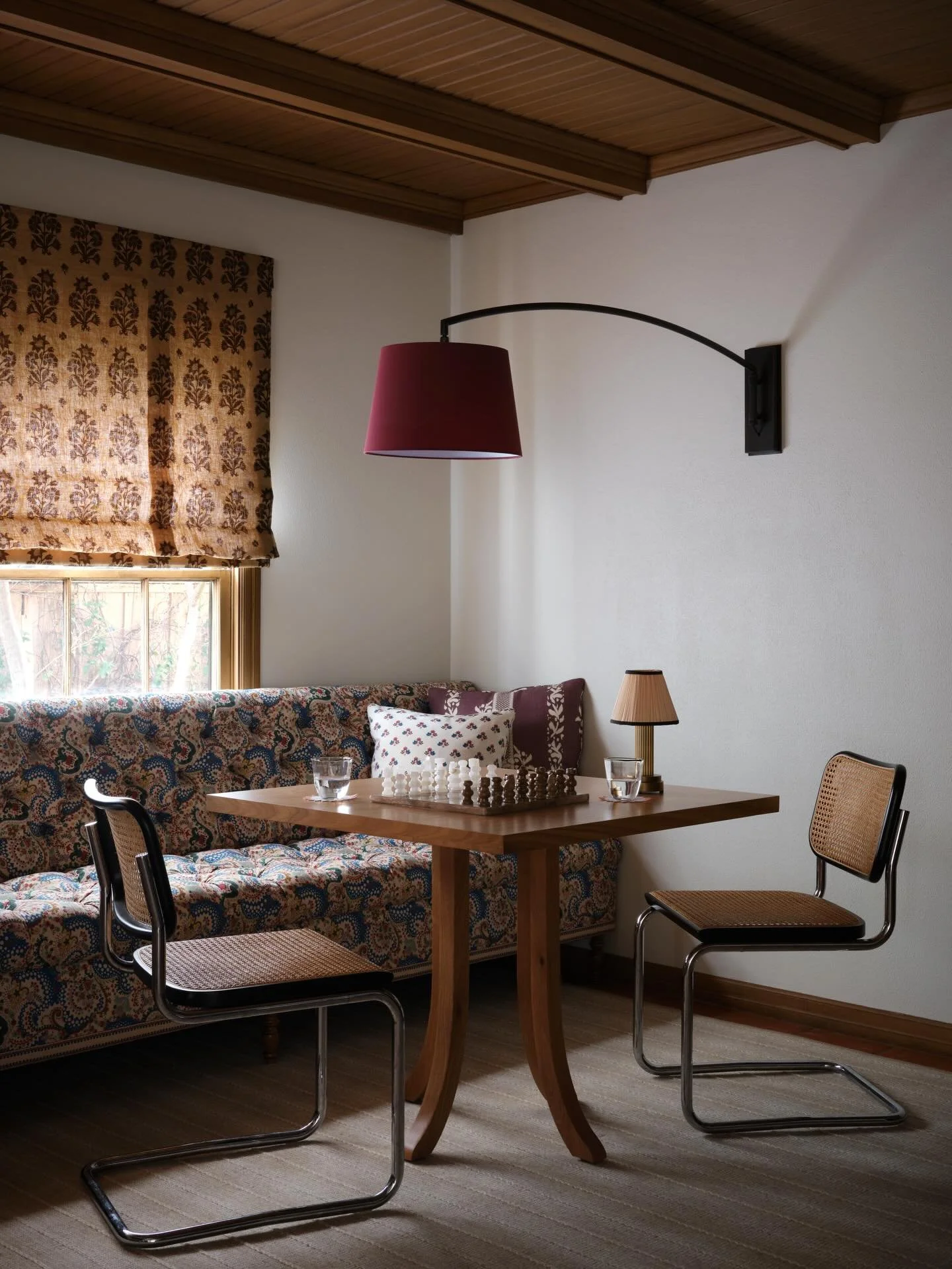 Game night ready! We designed this flexible area with a 14 foot custom banquette and double game tables for our clients who love to entertain. It doubles as dining overflow for guests when a competitive game of mahjong isn&rsquo;t happening!

Interio