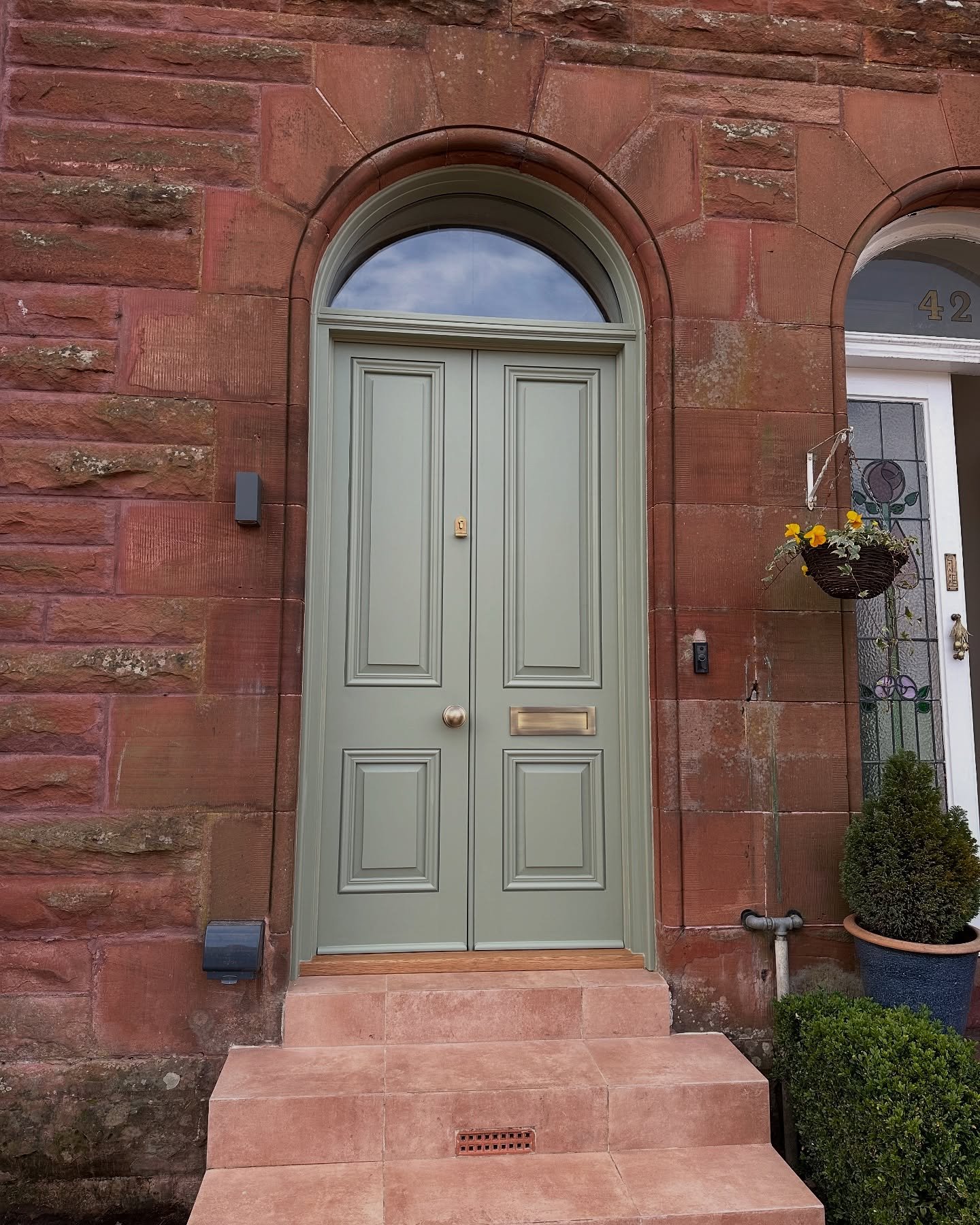 A set of storm doors with an arched top we fitted in Glasgow 🌚

Doors made by @stormdoorsglasgow 

Finished in @farrowandball &ldquo;Lichen&rdquo;

Email for any enquiries 🤠

.
.
.
.

#joinery #panneling #construction #kitchen 
#handmade #bathrooms