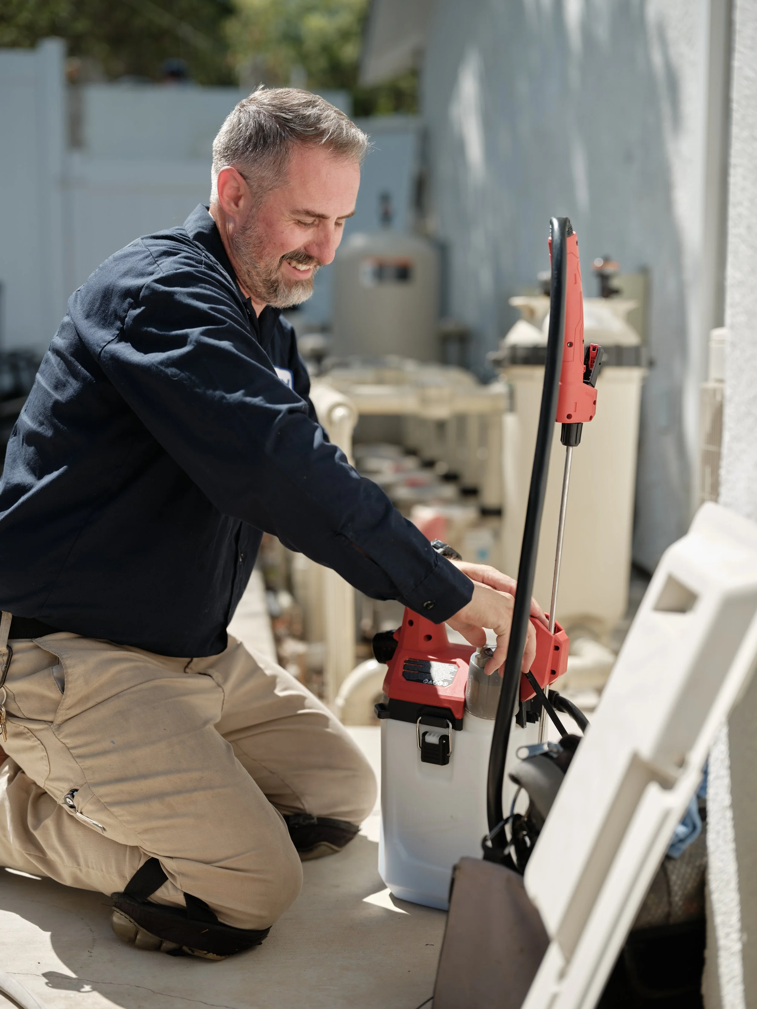 HVAC technician performing rooftop maintenance in Diamond Bar