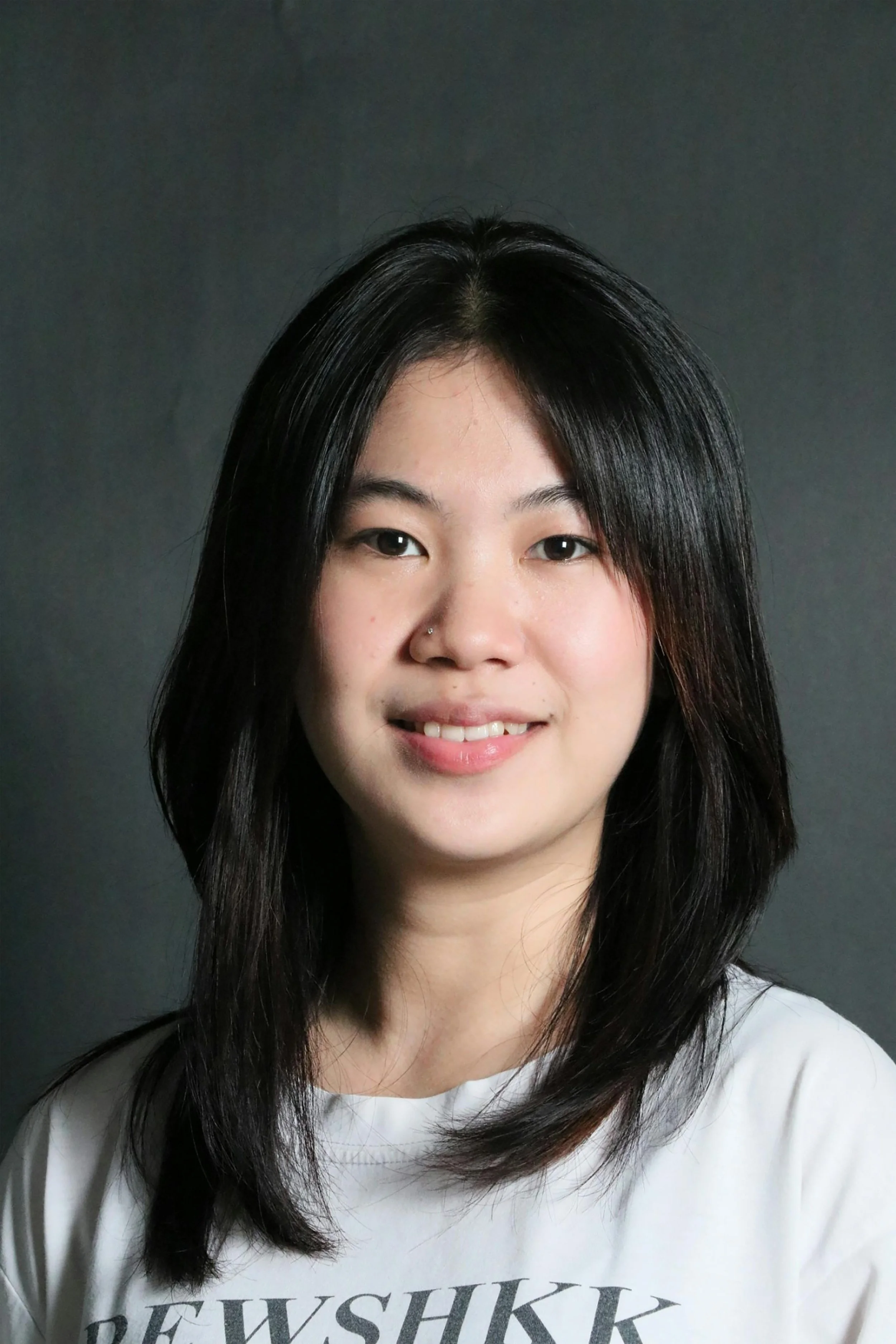 professional portrait headshot against grey background