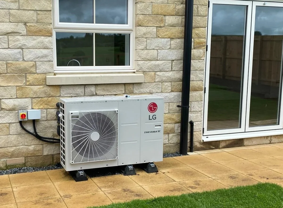 LG Therma V heat pump unit installed outside a home in Orange County